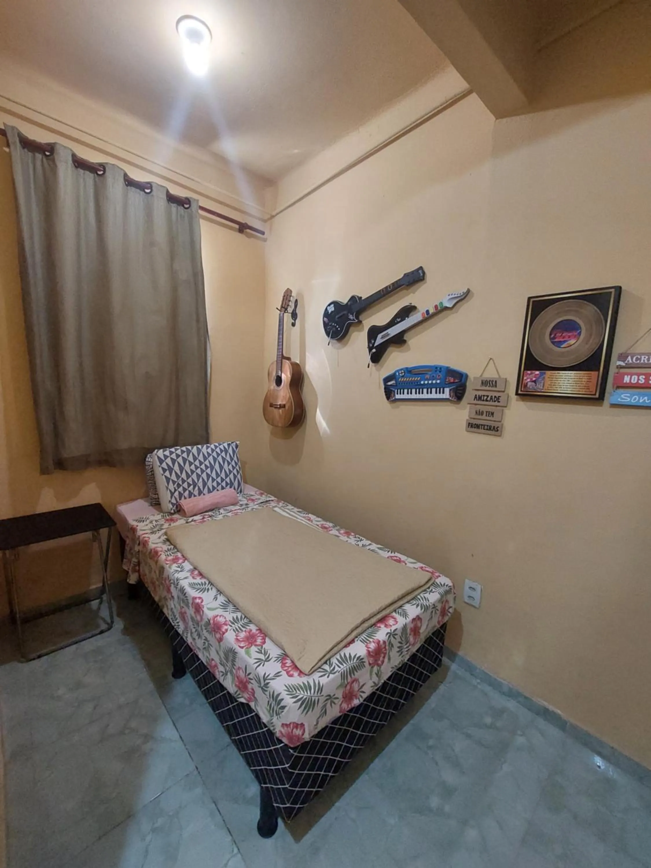 Bed in Pousada Cantinho da Família