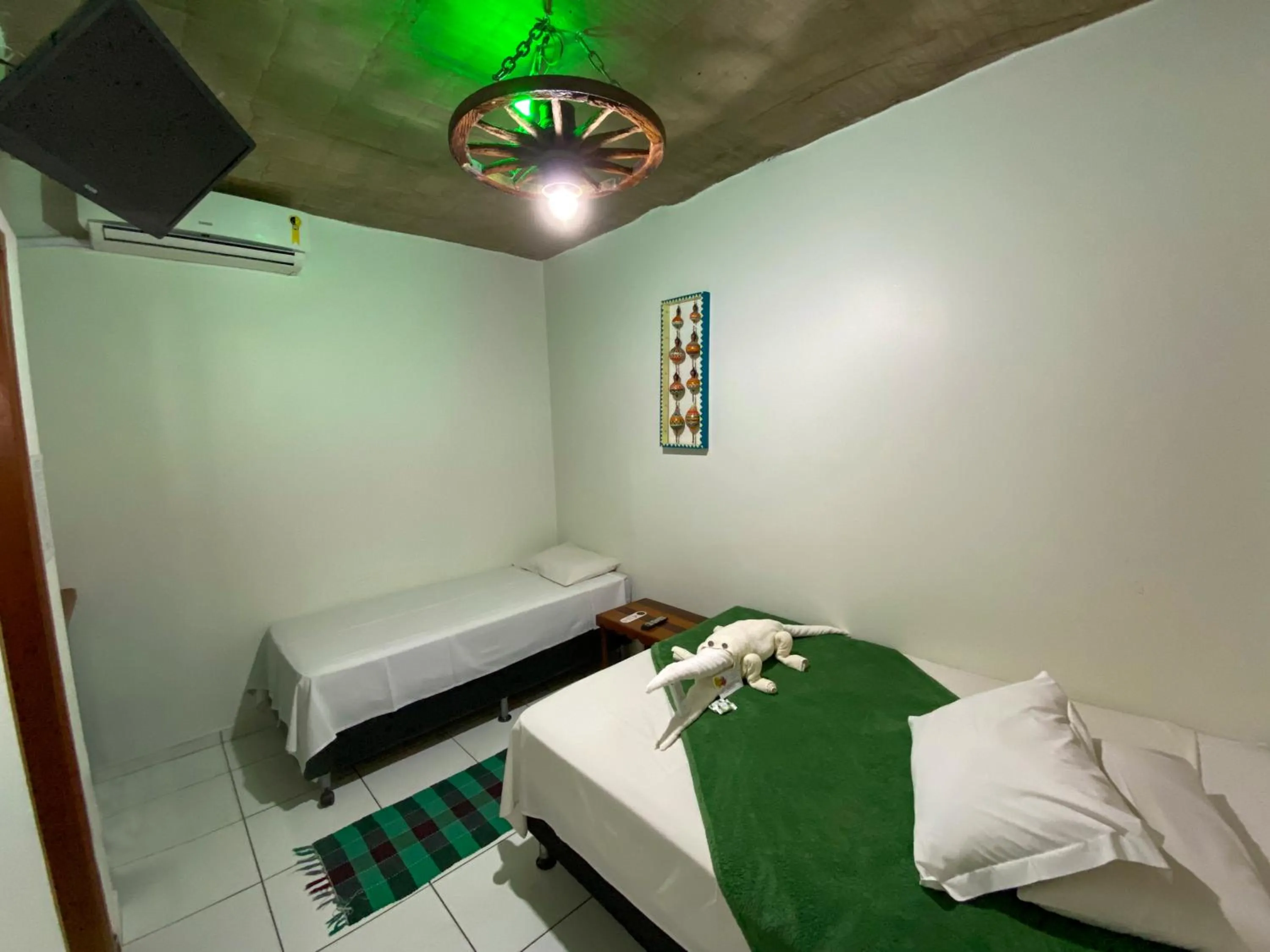 Bed in Pousada Segredo