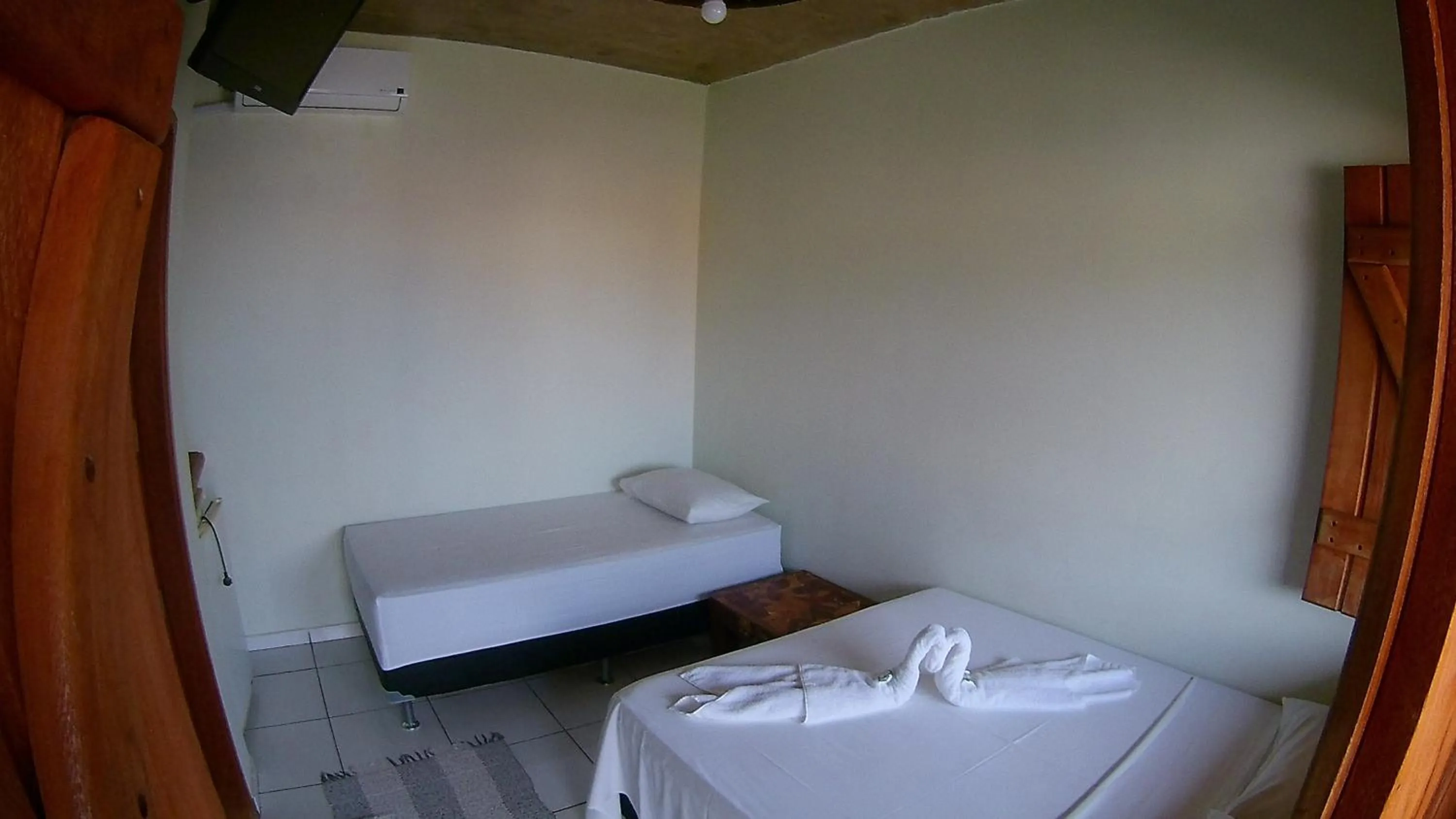 Bed in Pousada Segredo