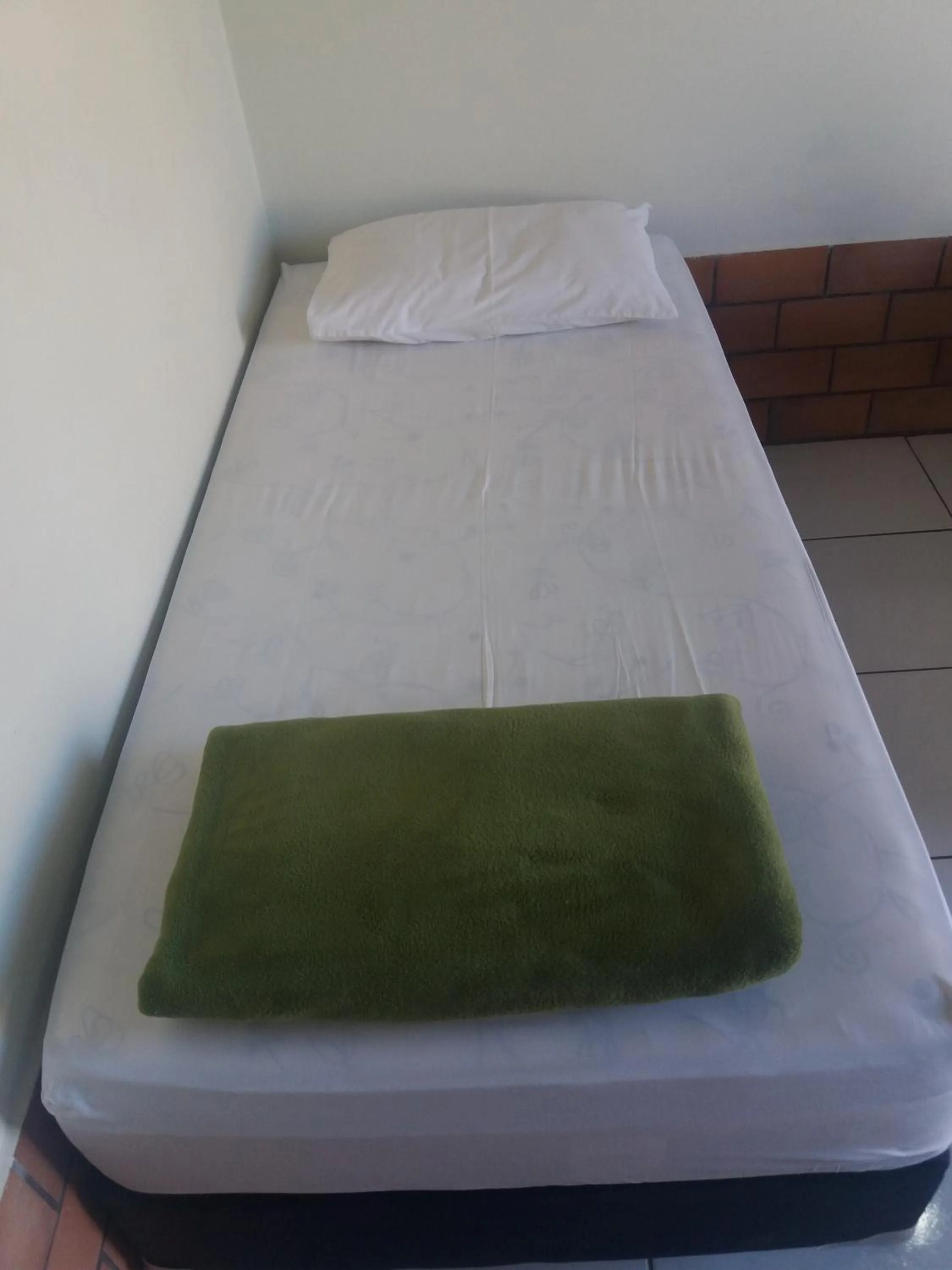 Bed in Pousada Segredo