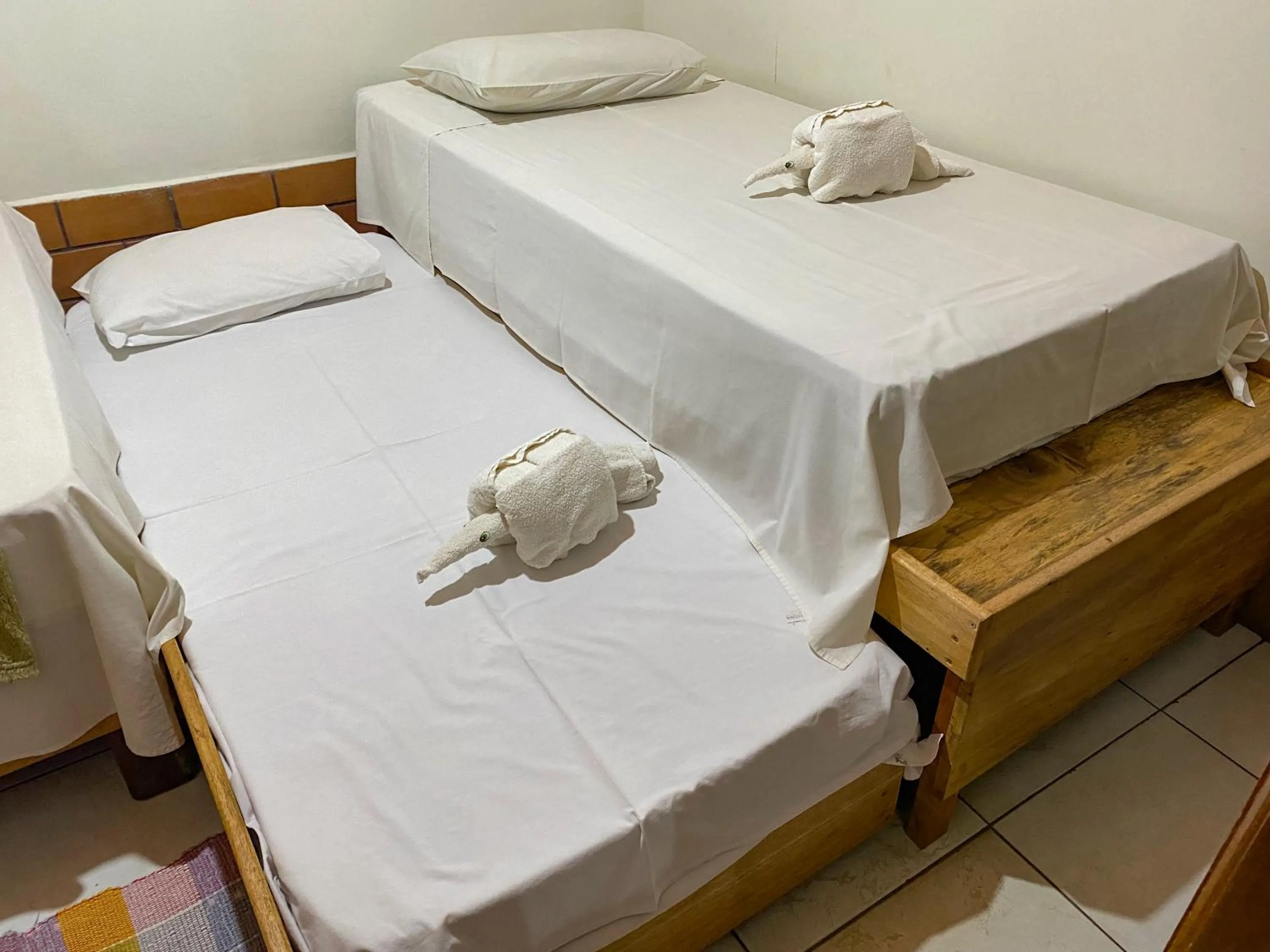 Bed in Pousada Segredo