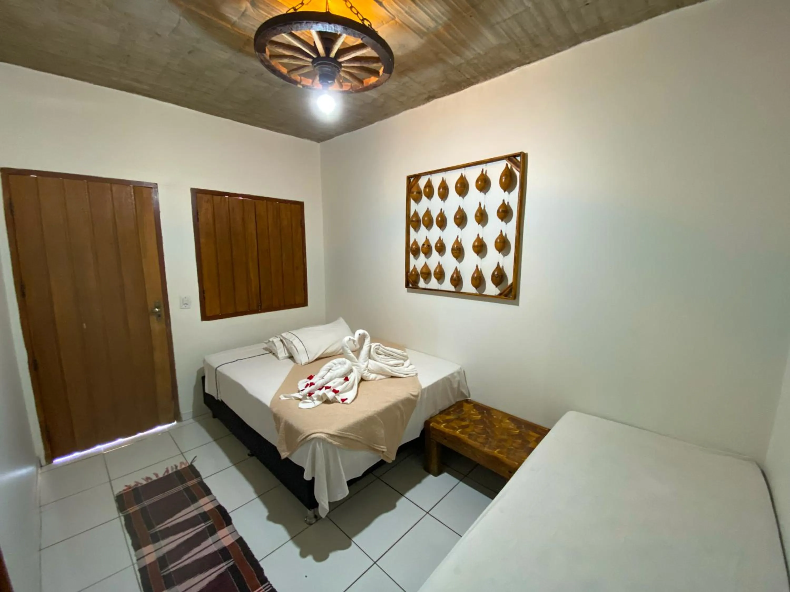 Bed in Pousada Segredo