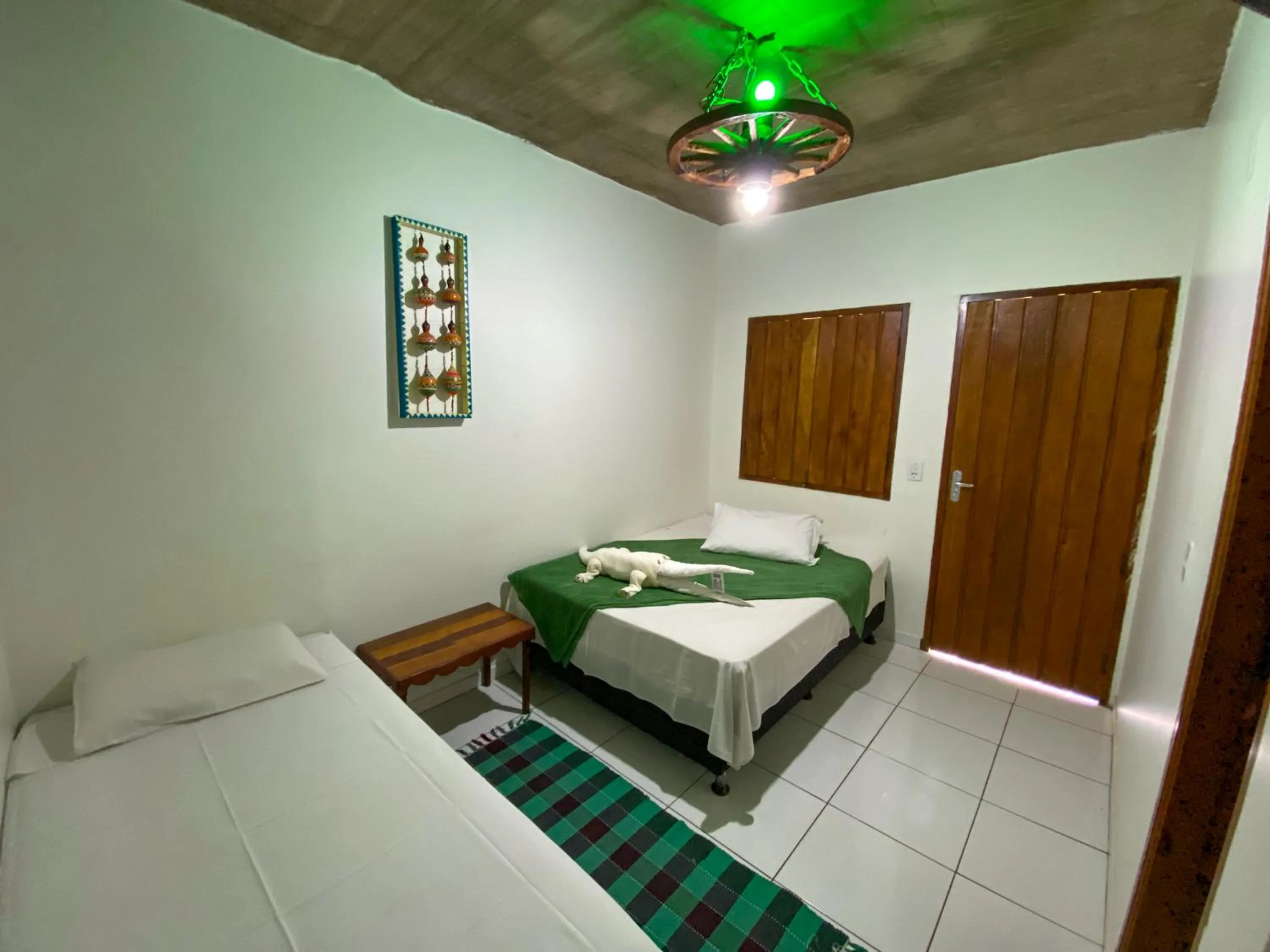 Bed in Pousada Segredo