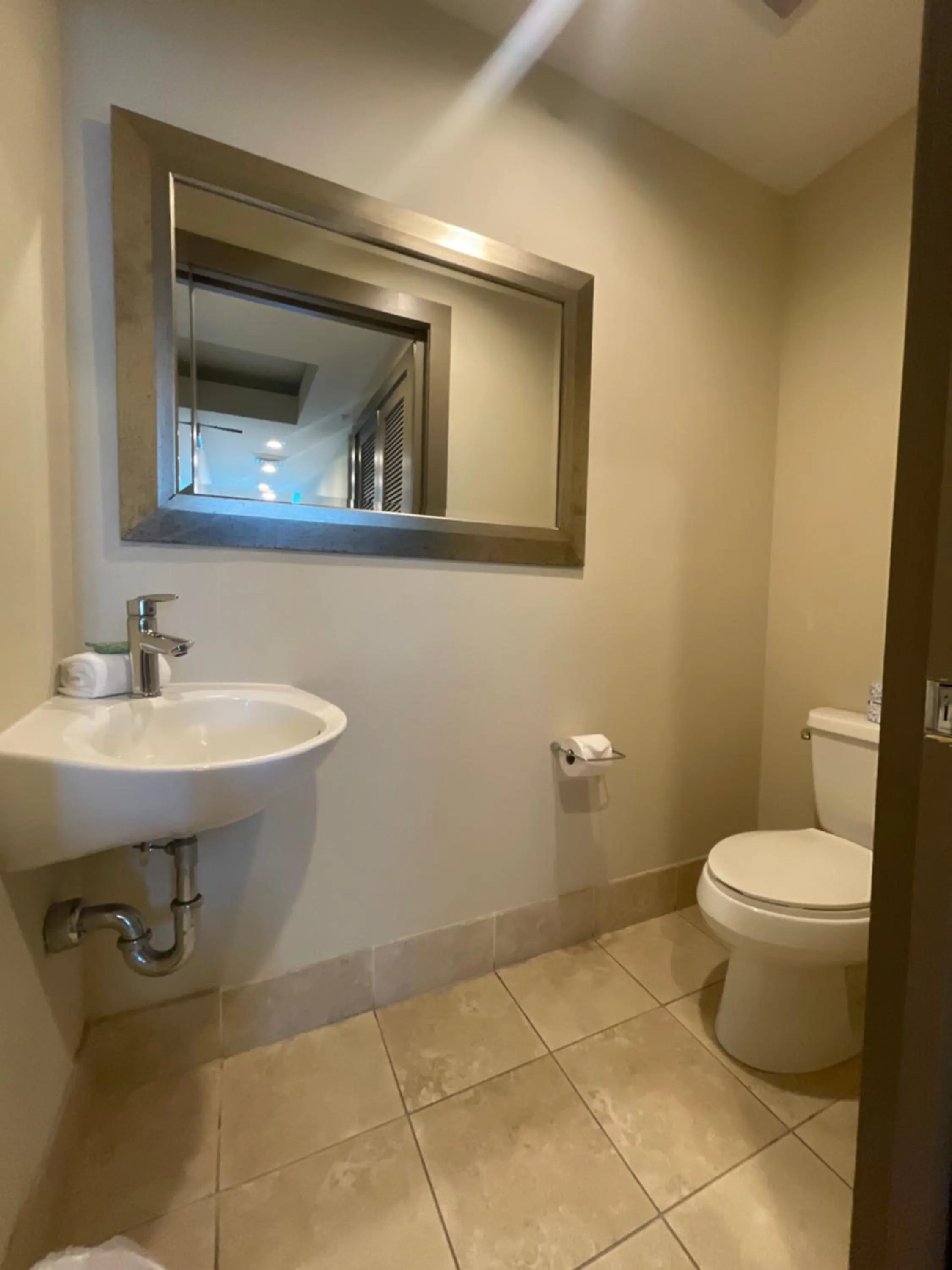 Toilet in South Beach Biloxi Hotel & Suites