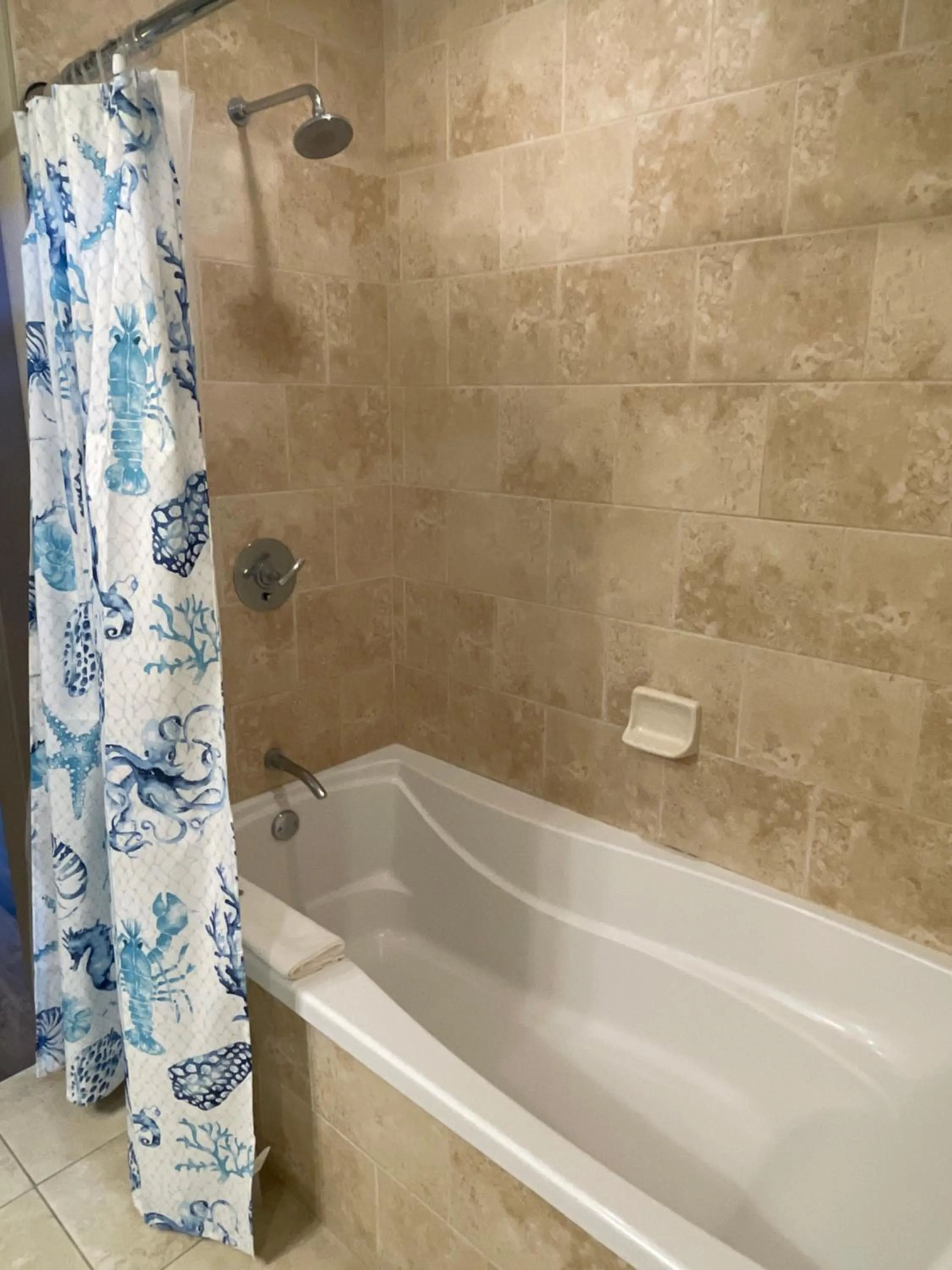 Bathroom in South Beach Biloxi Hotel & Suites