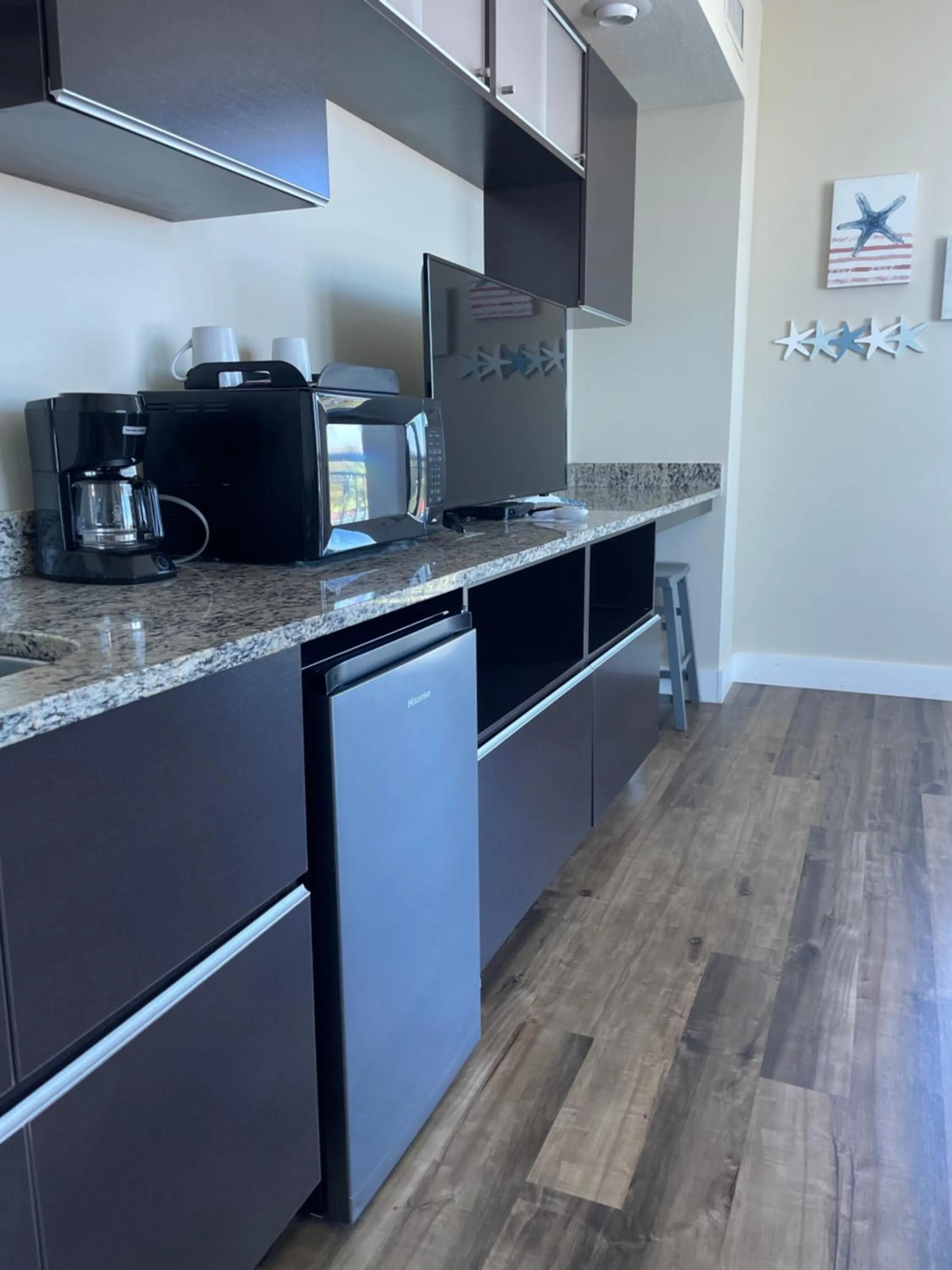 Kitchen or kitchenette in South Beach Biloxi Hotel & Suites