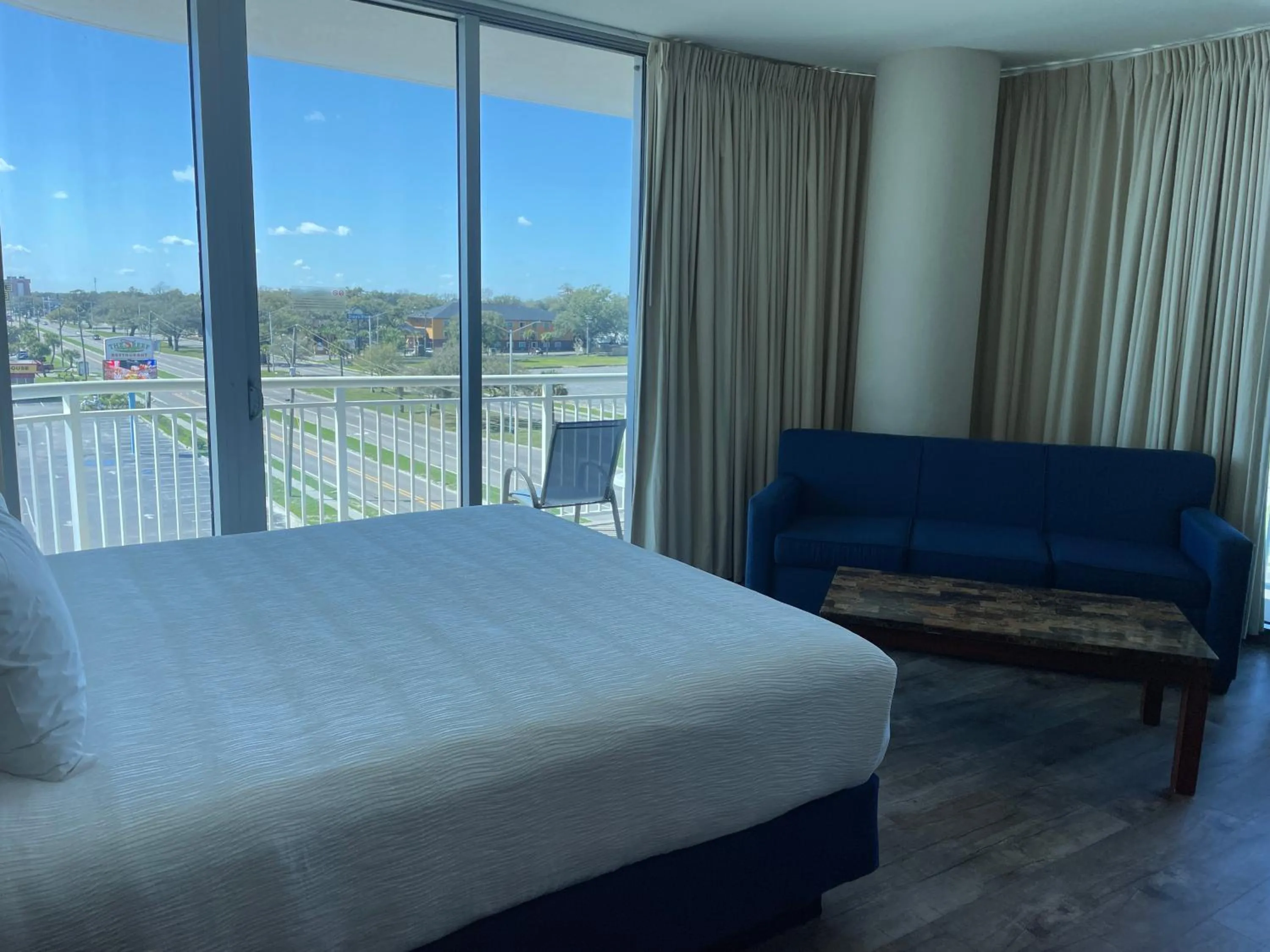 Bed in South Beach Biloxi Hotel & Suites