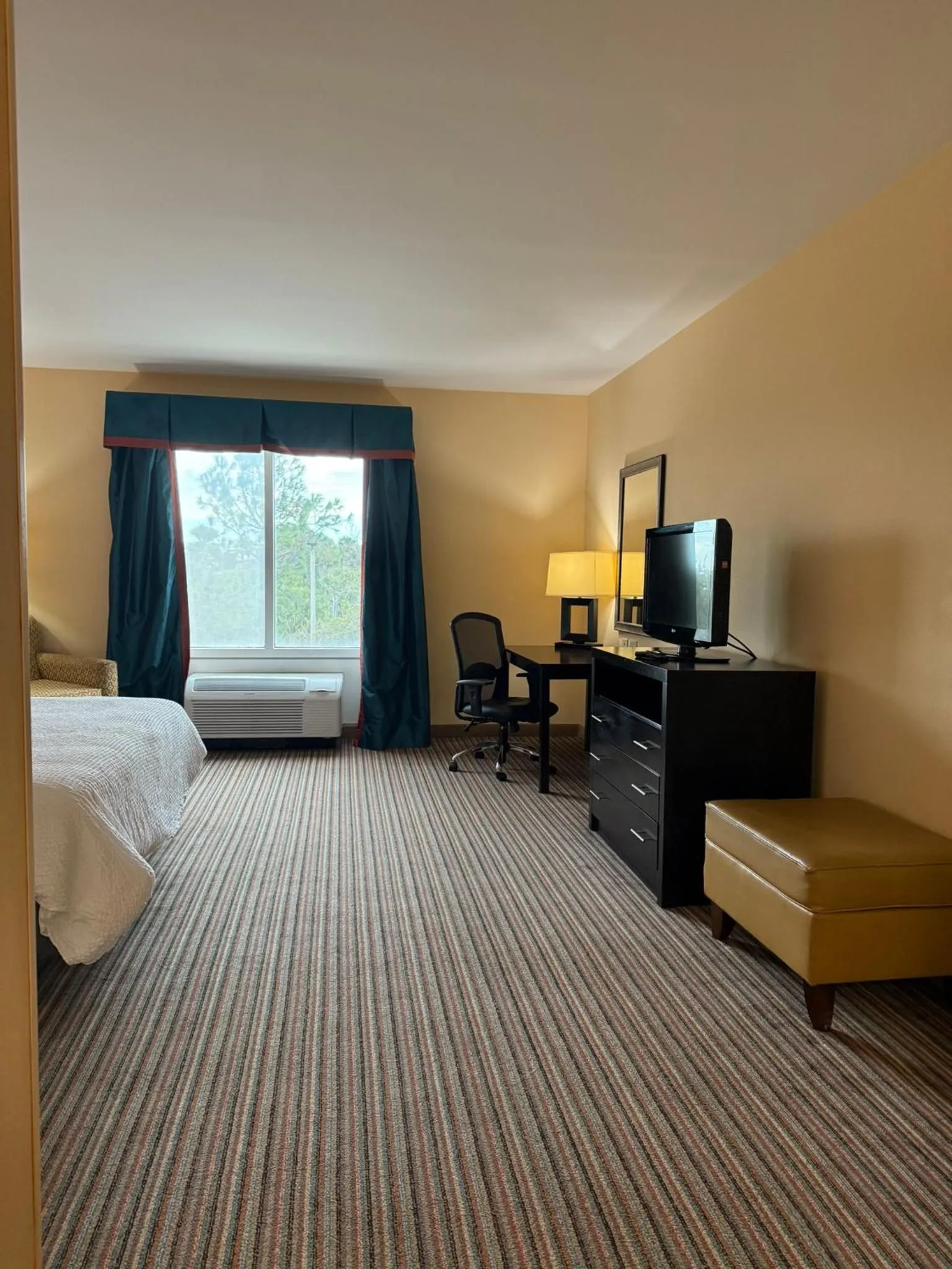 Photo of the whole room, Bed in Holiday Inn Titusville/Kennedy Space Center by IHG