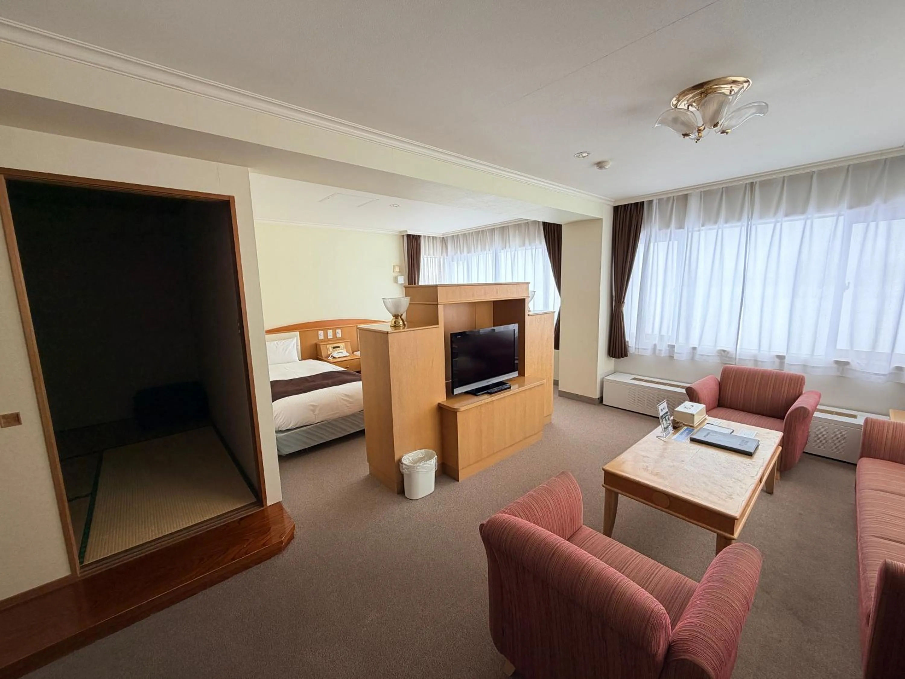 Living room, Bed in Furano La Terre