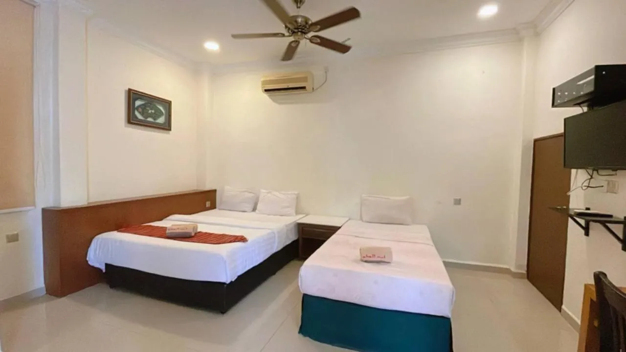 Bed in Adina Drive In Motel