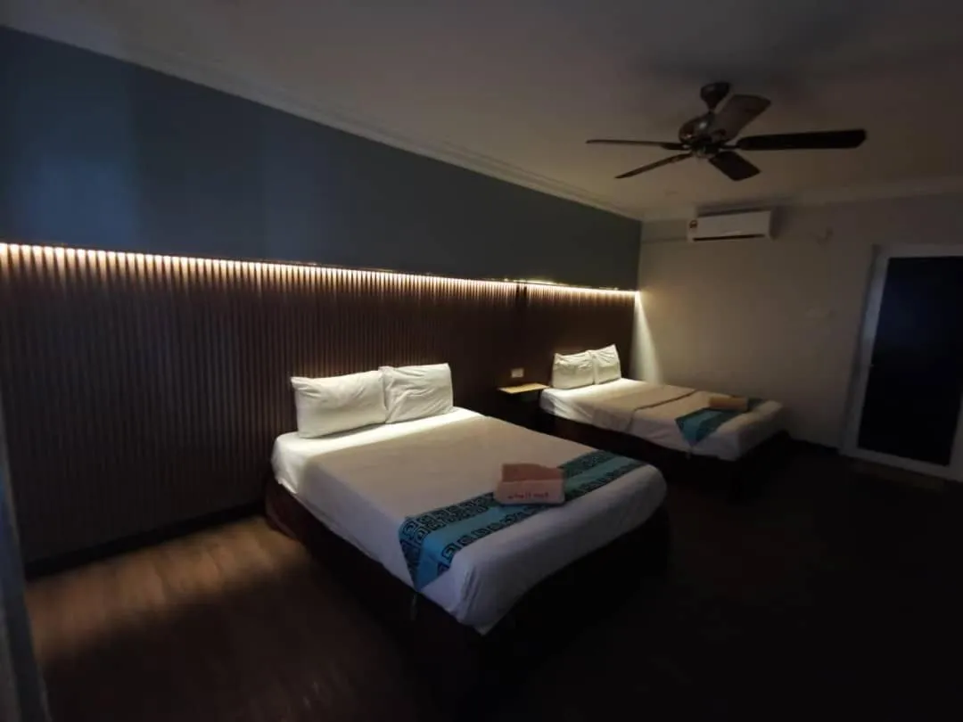 Bed in Adina Drive In Motel