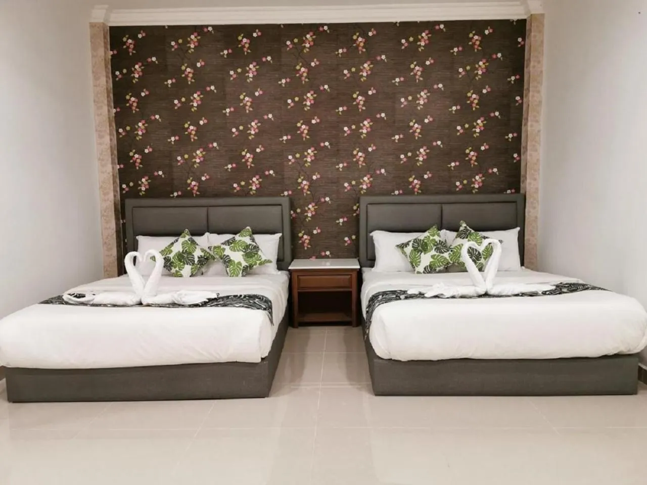 Bed in Adina Drive In Motel