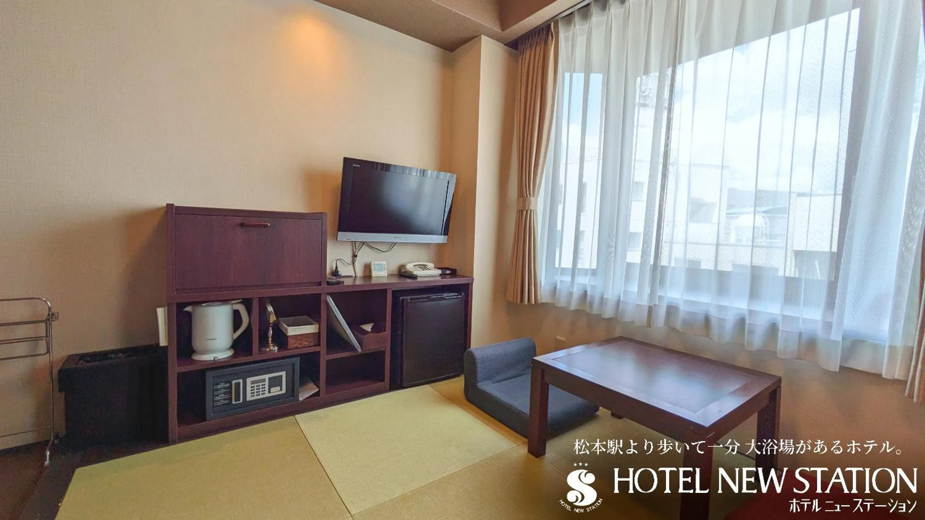 Photo of the whole room, Bed in Hotel New Station