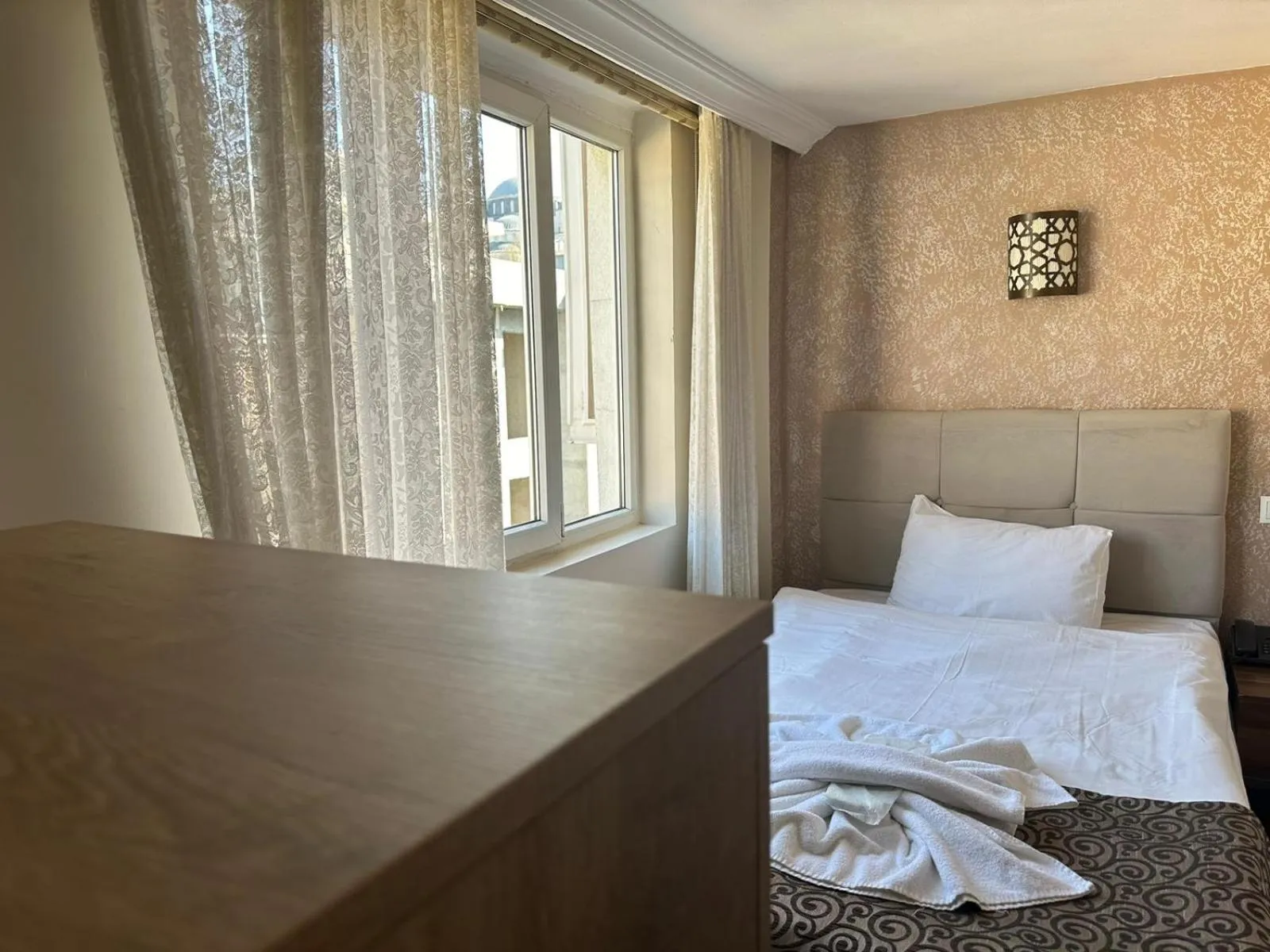 Bed in Hotel Buhara Family Inn