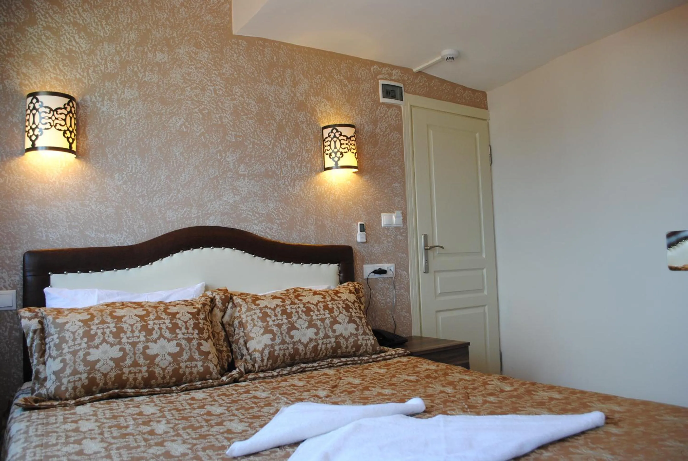 Bedroom in Hotel Buhara Family Inn