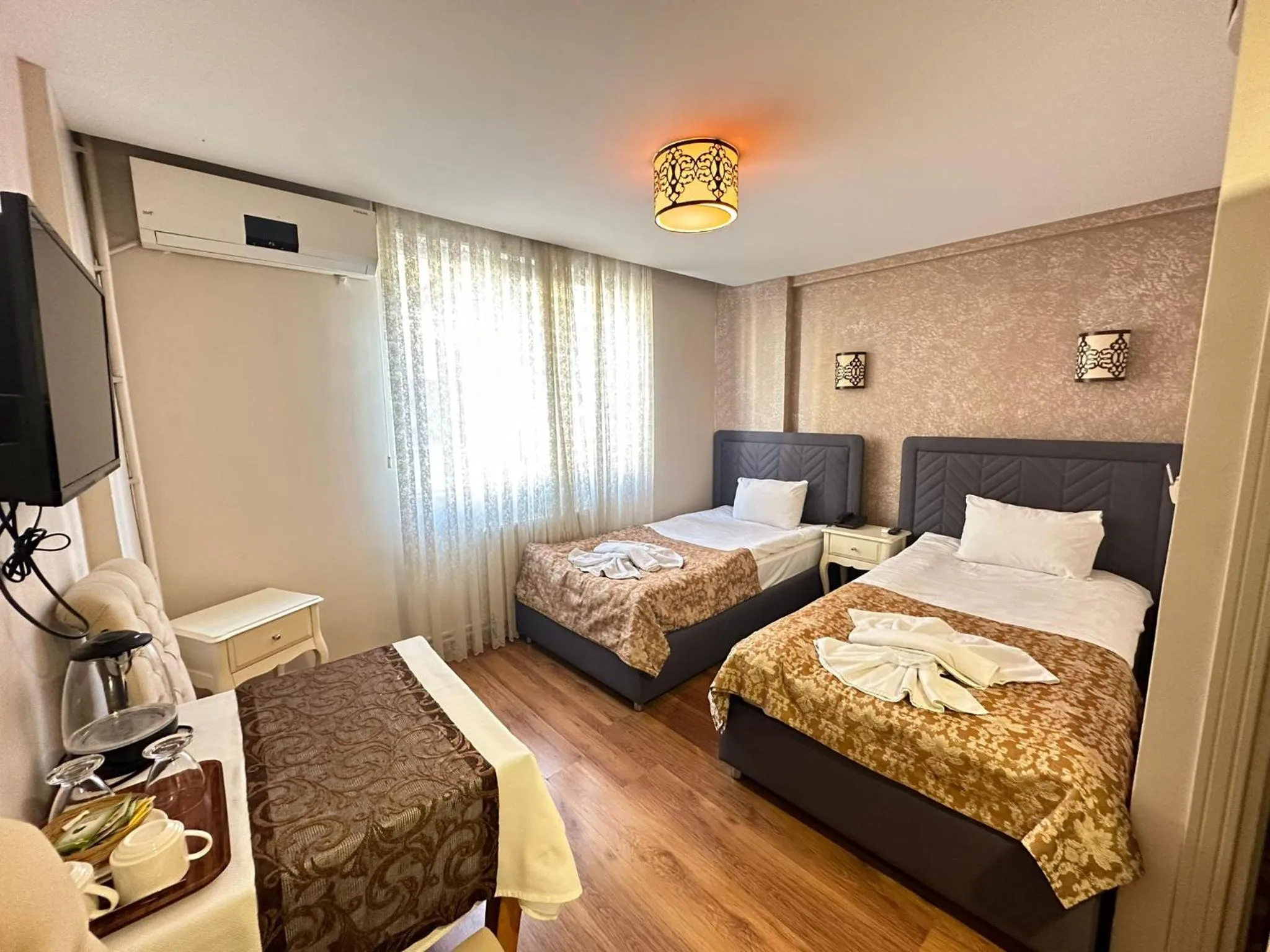 Bed in Hotel Buhara Family Inn