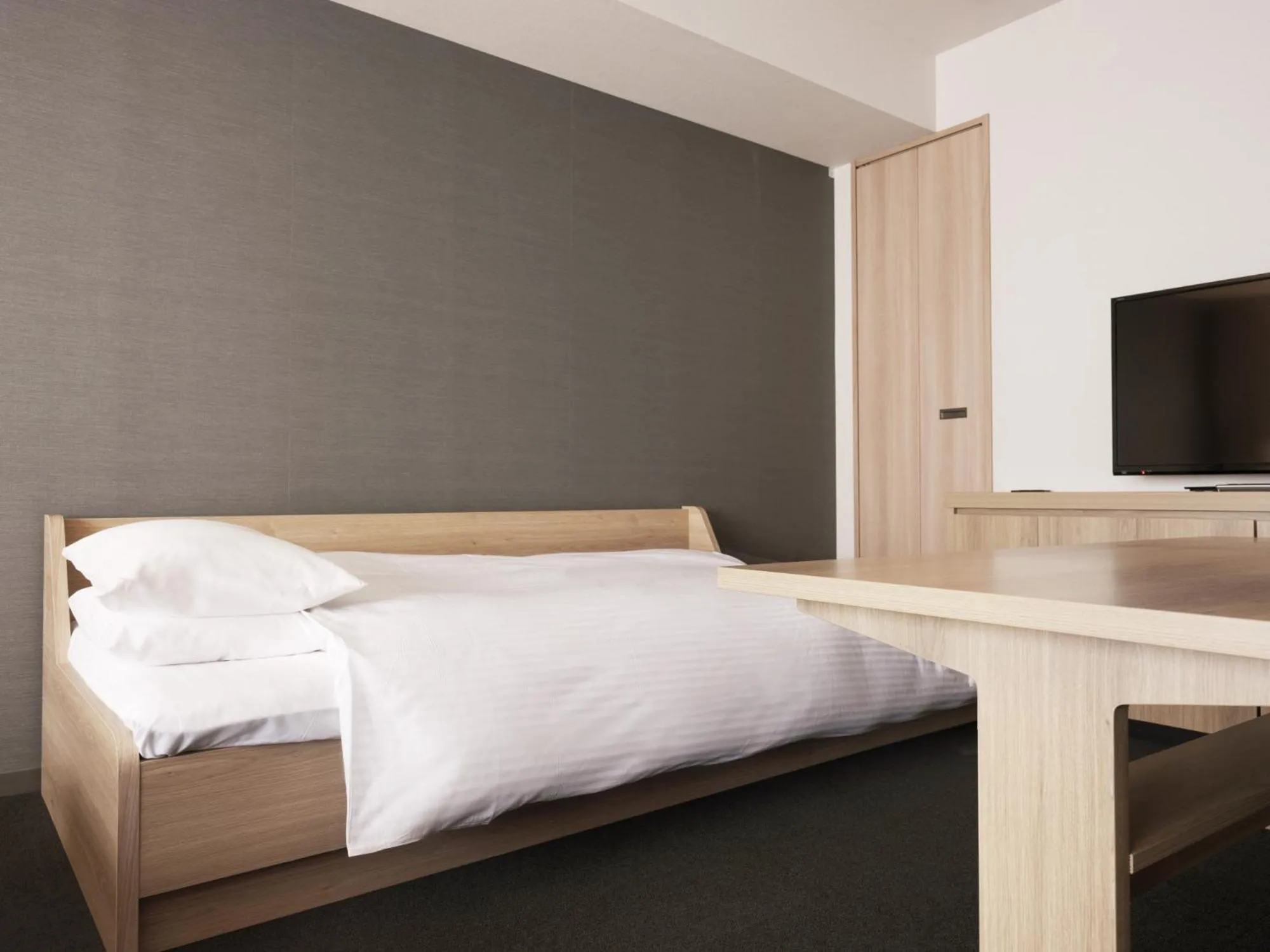 Bed in MIMARU Tokyo Nihombashi Suitengumae