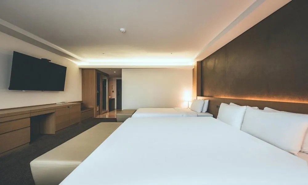 Bed in Wonju City Hotel HYEOKSIN