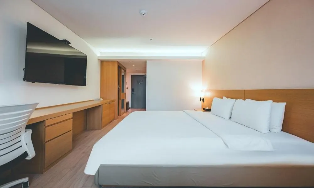 Bed in Wonju City Hotel HYEOKSIN