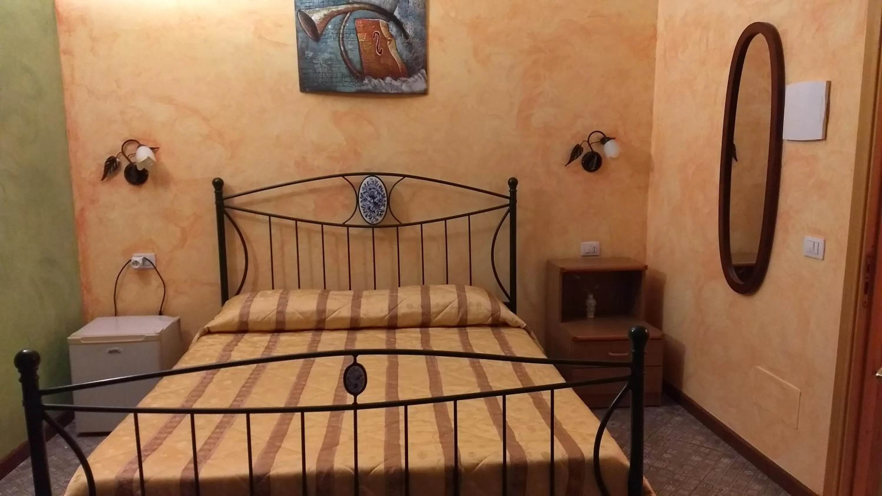 Photo of the whole room, Bed in Palazzo Aprile