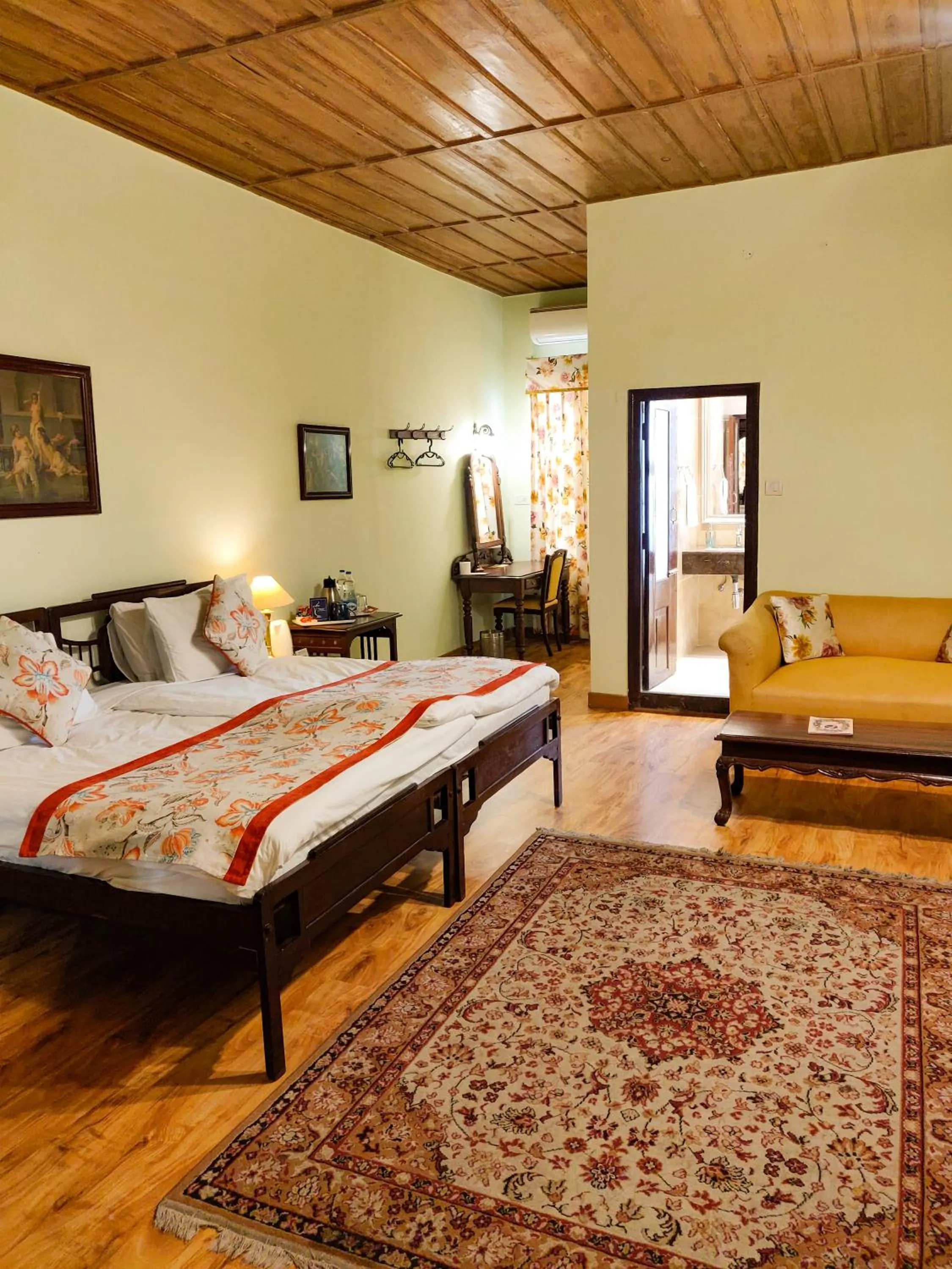 Bed in WelcomHeritage Kasmanda Palace