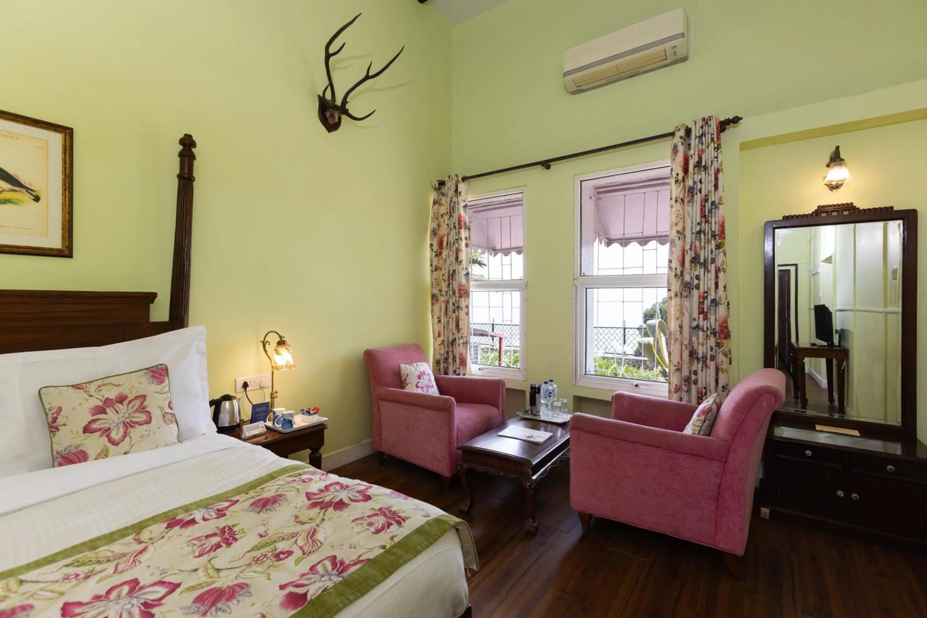 Seating area, Bed in WelcomHeritage Kasmanda Palace