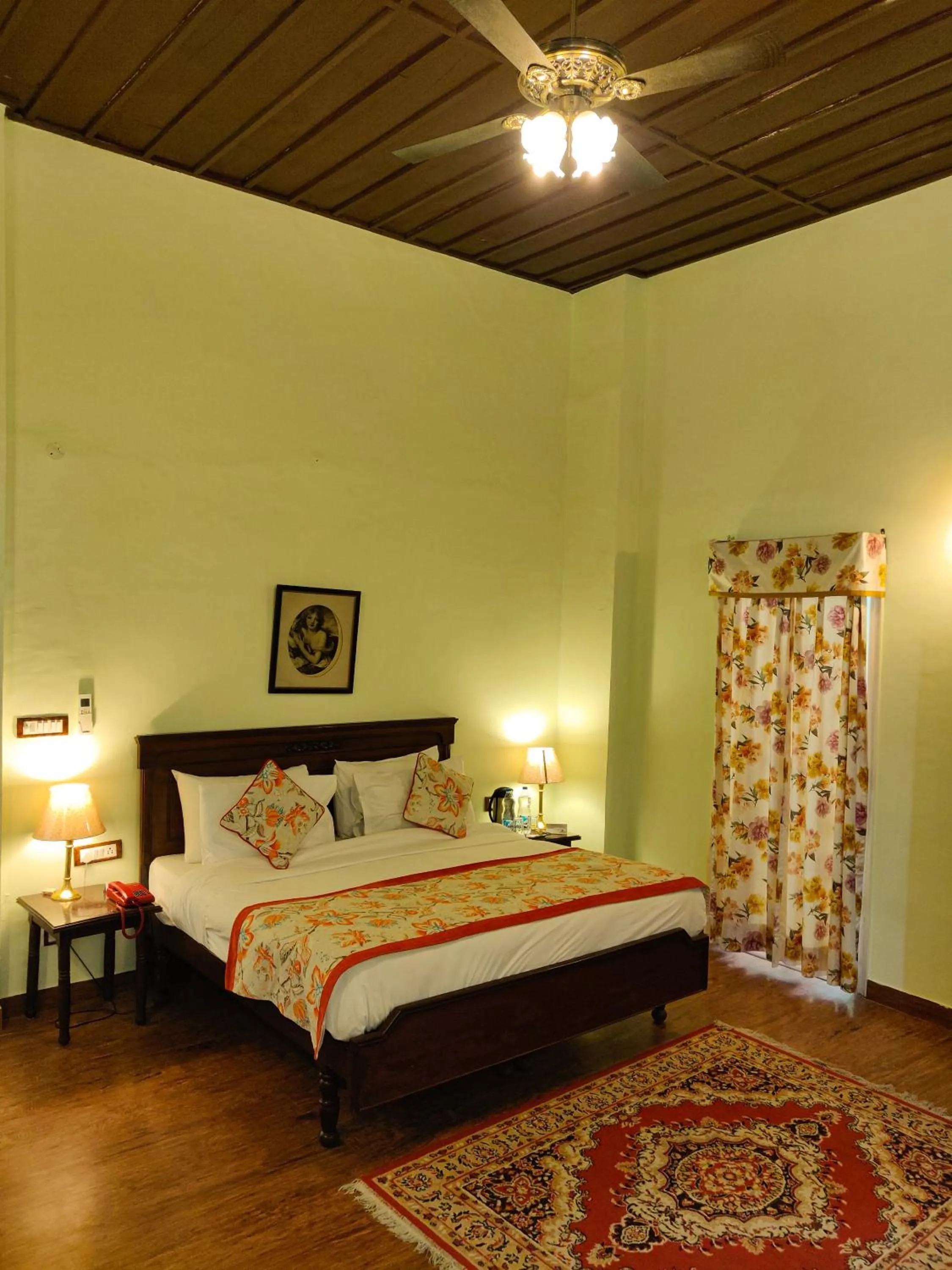 Bed in WelcomHeritage Kasmanda Palace