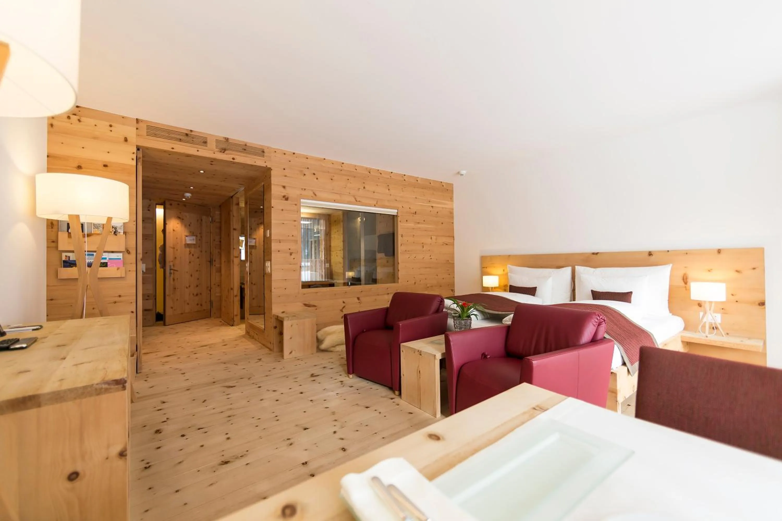 Photo of the whole room in Relais & Châteaux IN LAIN Hotel Cadonau