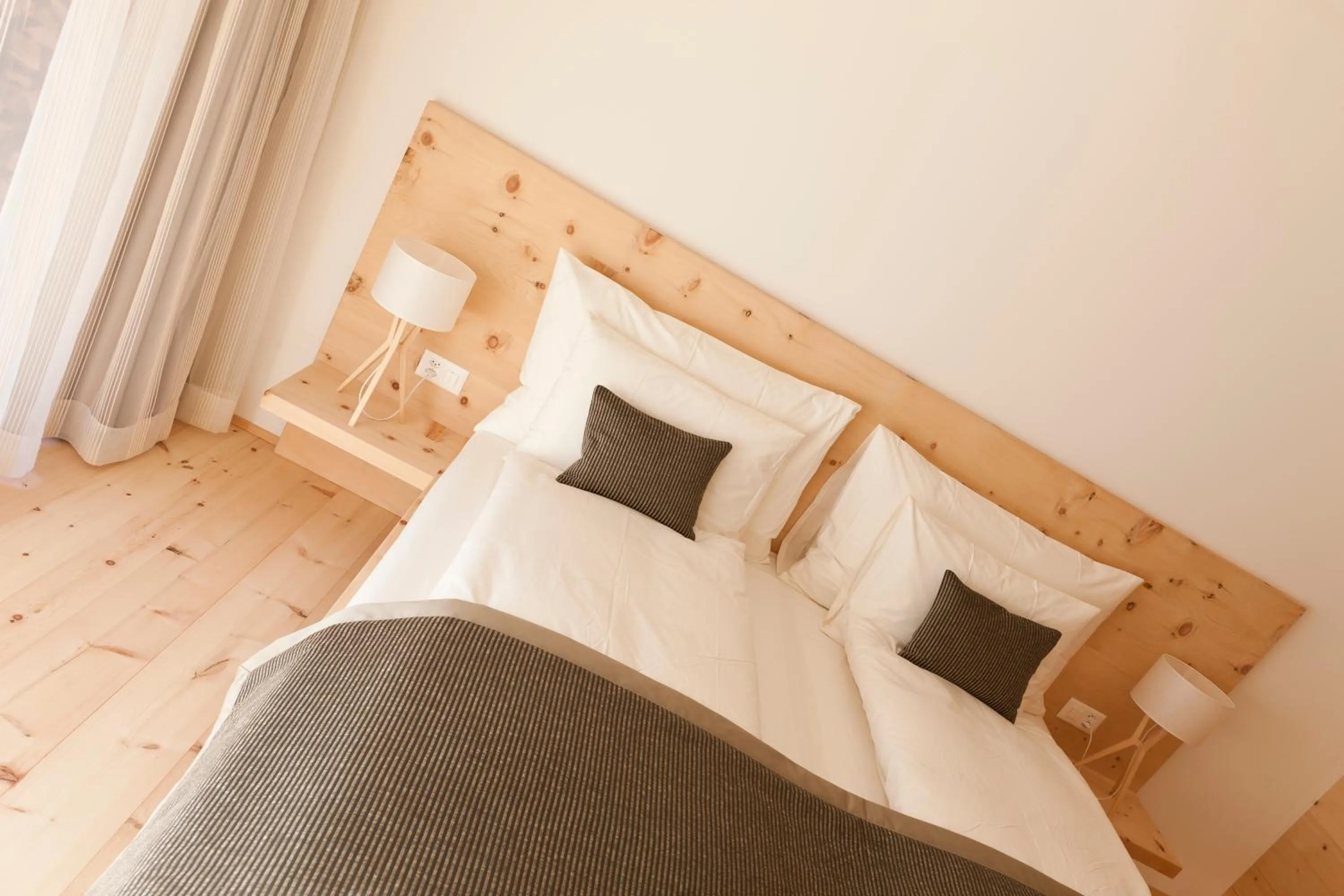 Bedroom, Bed in Relais & Châteaux IN LAIN Hotel Cadonau