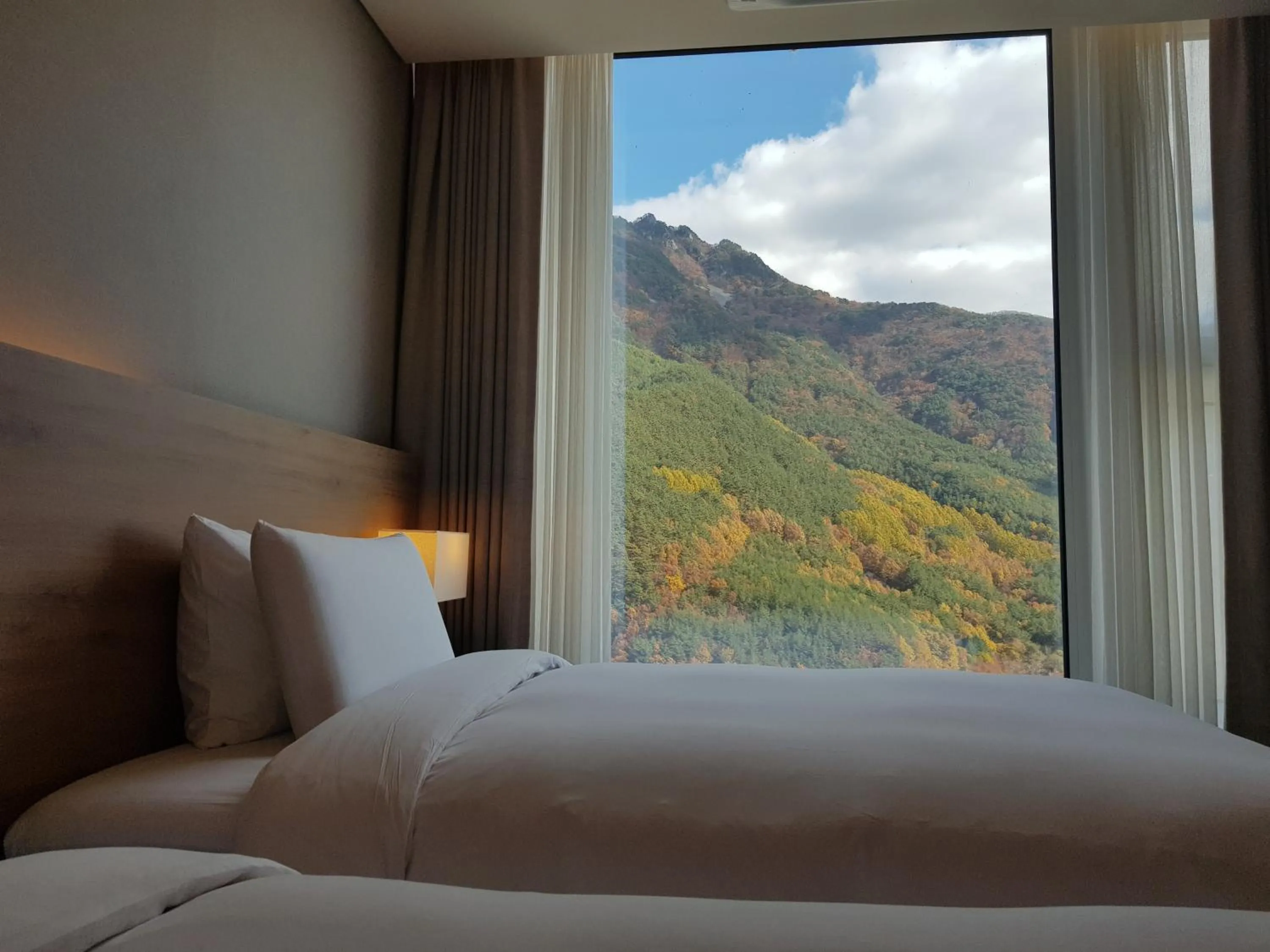 Bed in PARK ROCHE Resort & Wellness