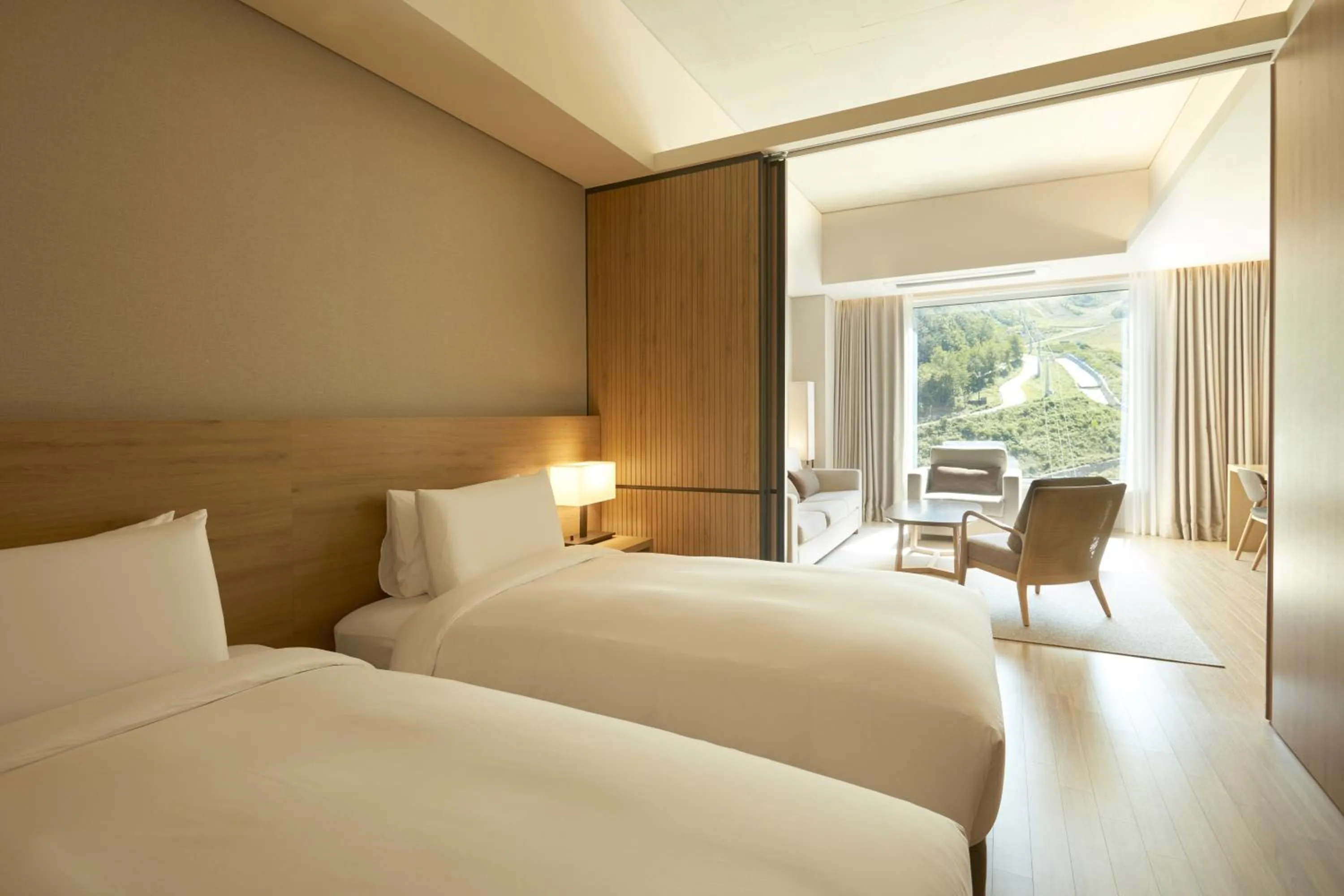 Bed in PARK ROCHE Resort & Wellness