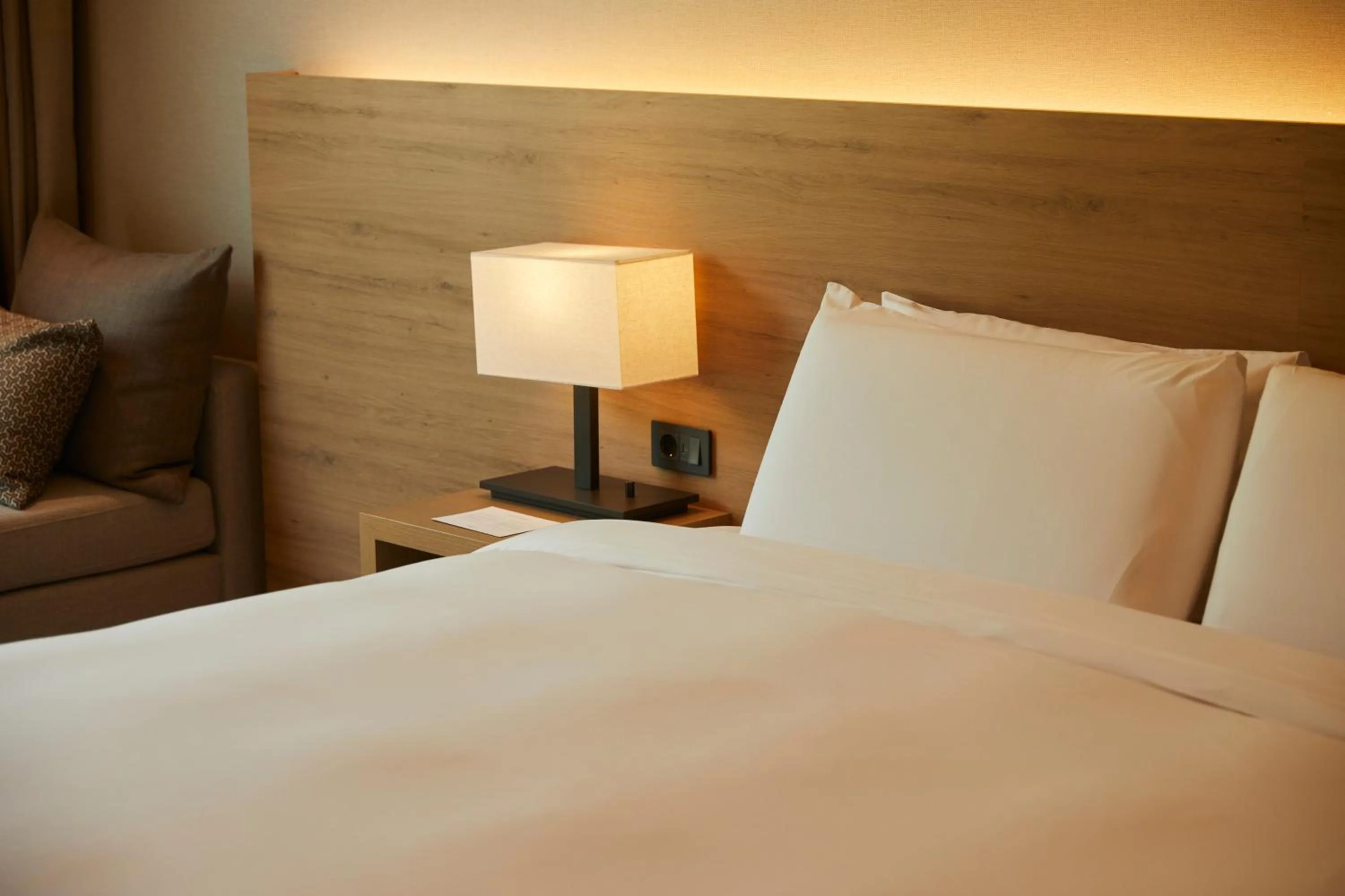 Bed in PARK ROCHE Resort & Wellness