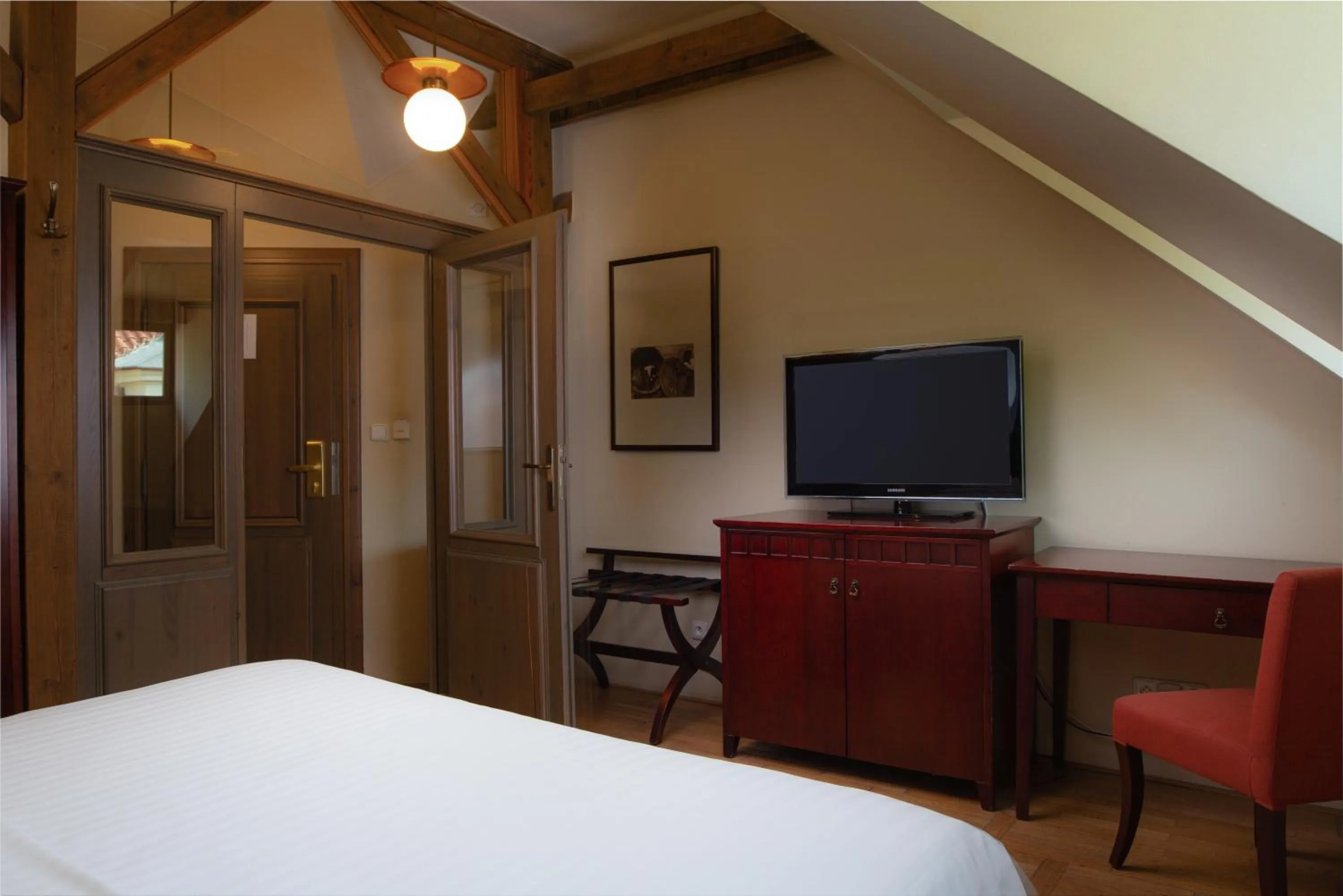 Photo of the whole room, Bed in Charles Bridge Rooms & Suites by SIVEK HOTELS