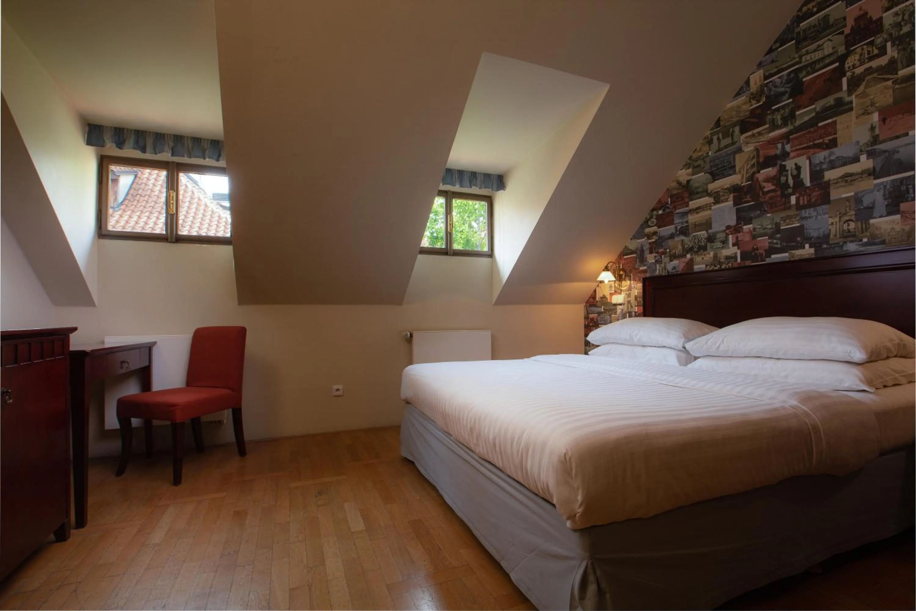 Bed in Charles Bridge Rooms & Suites by SIVEK HOTELS