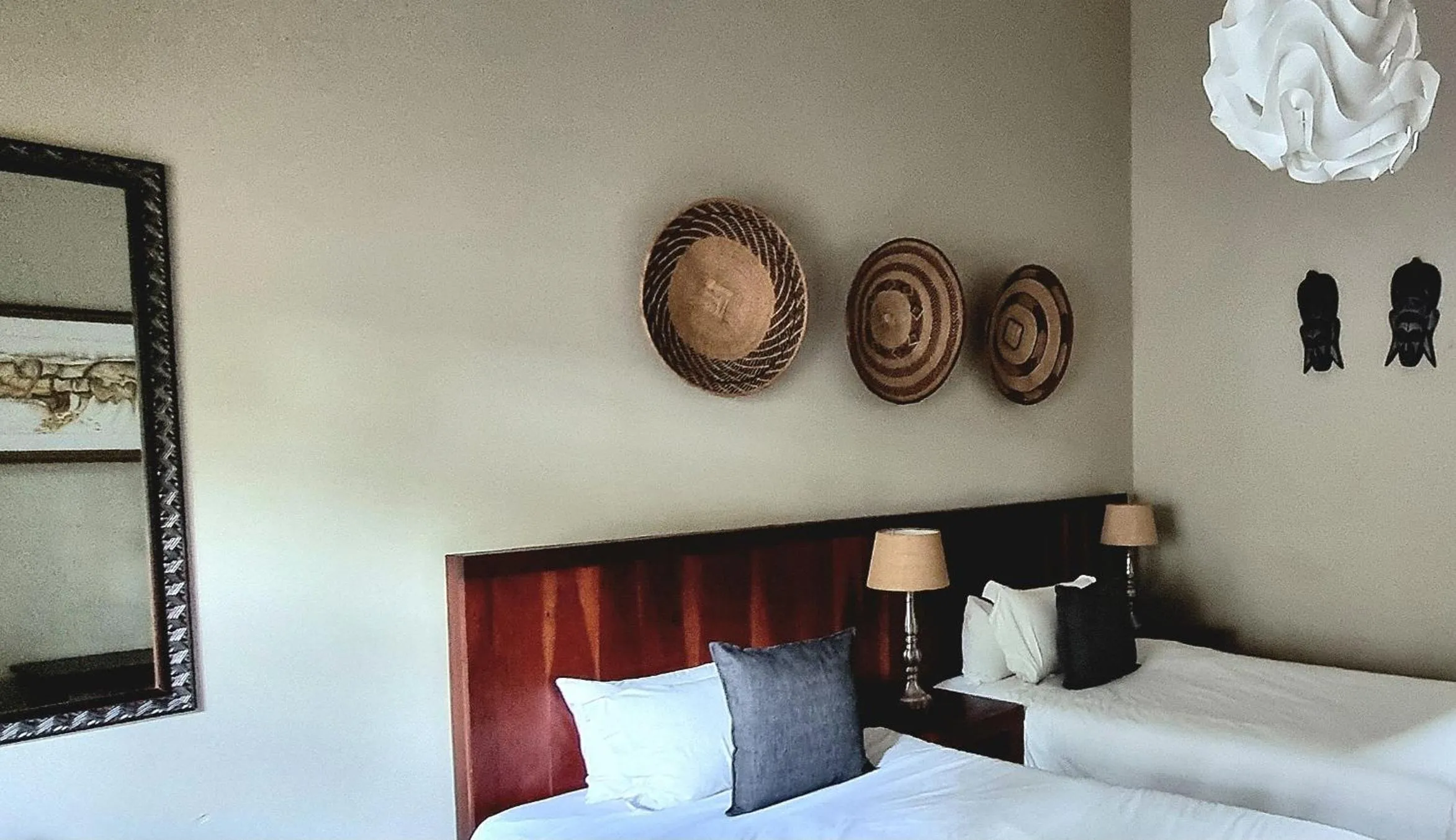 Bed in African Roots Guest House