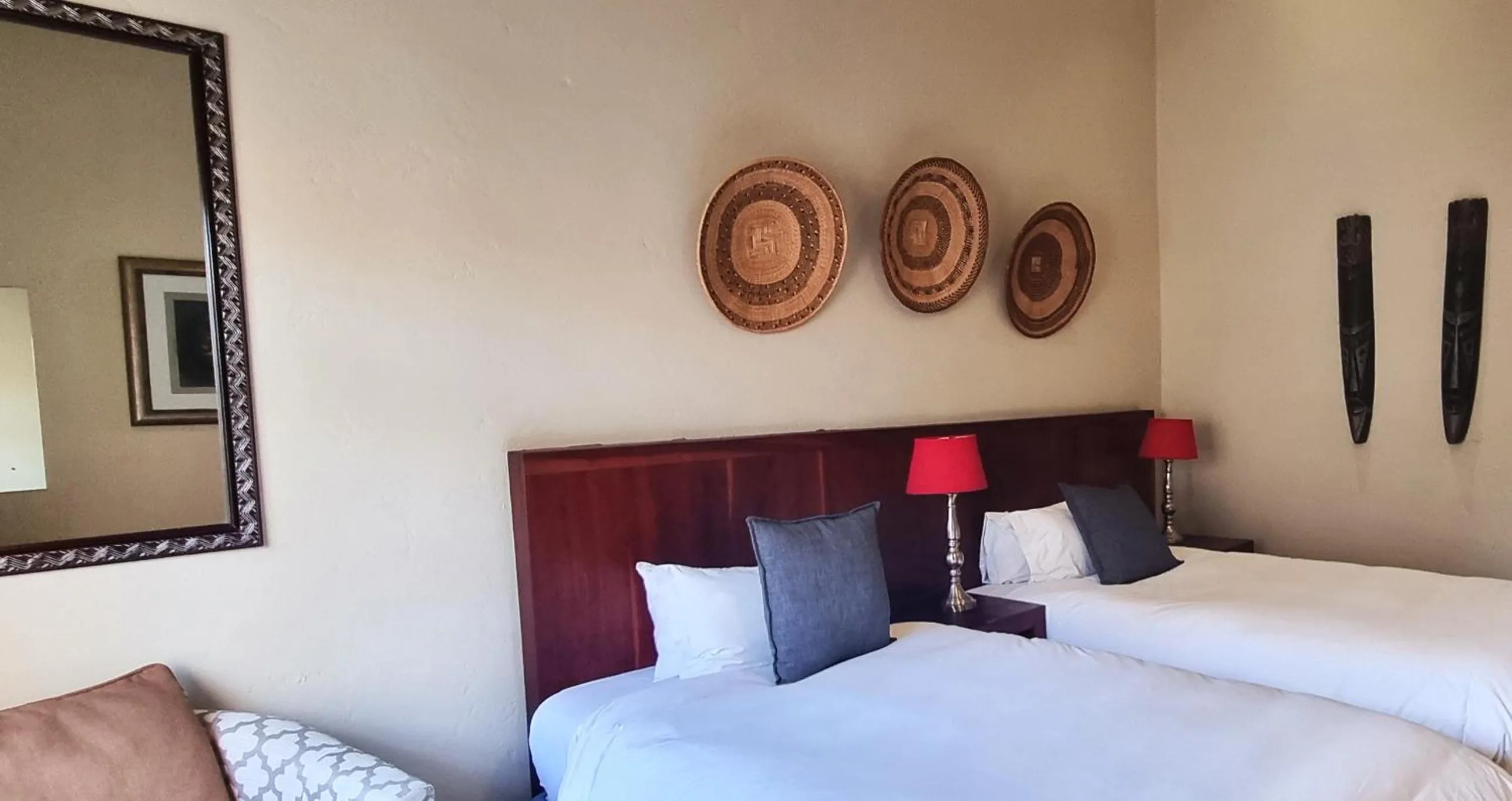 Bed in African Roots Guest House