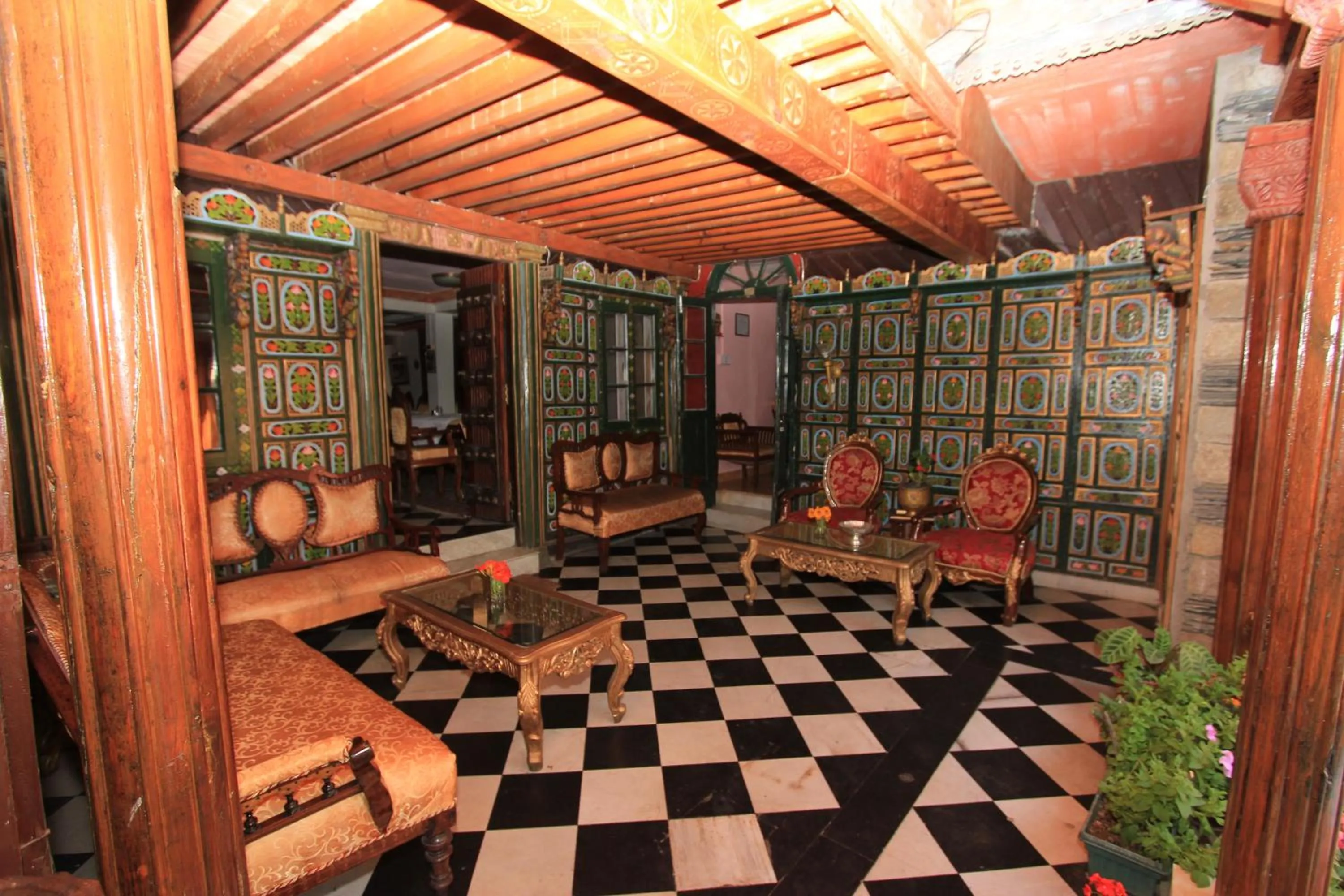 Seating area in WelcomHeritage Grace Hotel