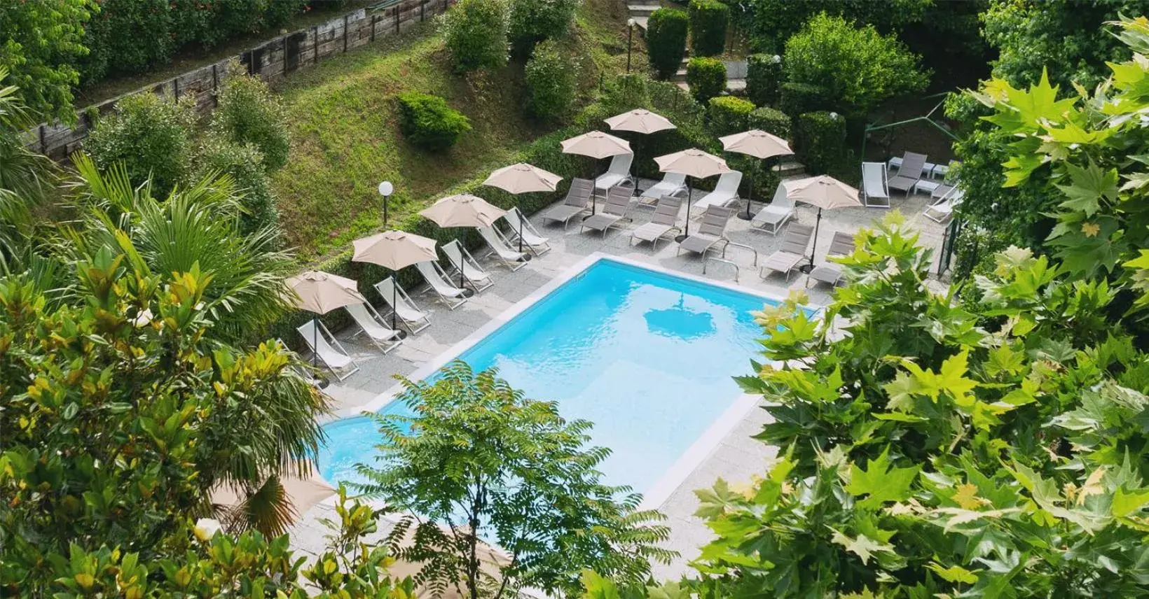 Garden, Pool View in Hotel Fossati Garden, Pool View in Hotel Fossati