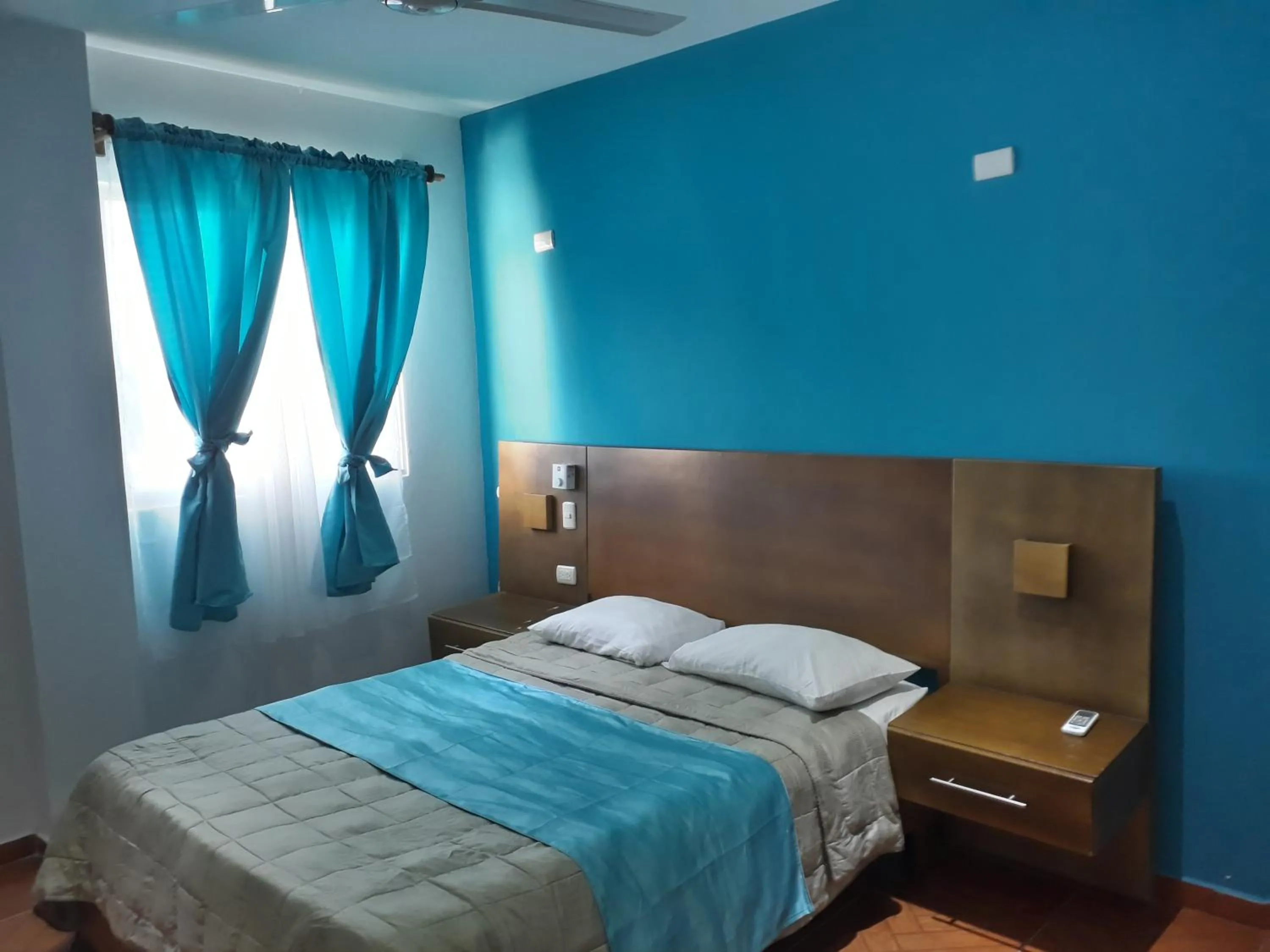 Photo of the whole room, Bed in Figaro Hotel Samana