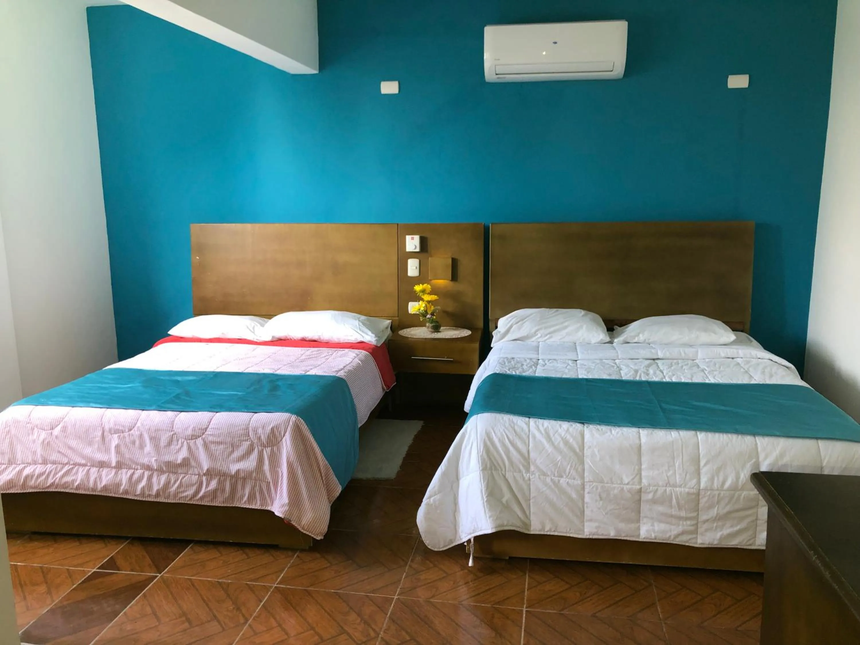 Bed in Figaro Hotel Samana