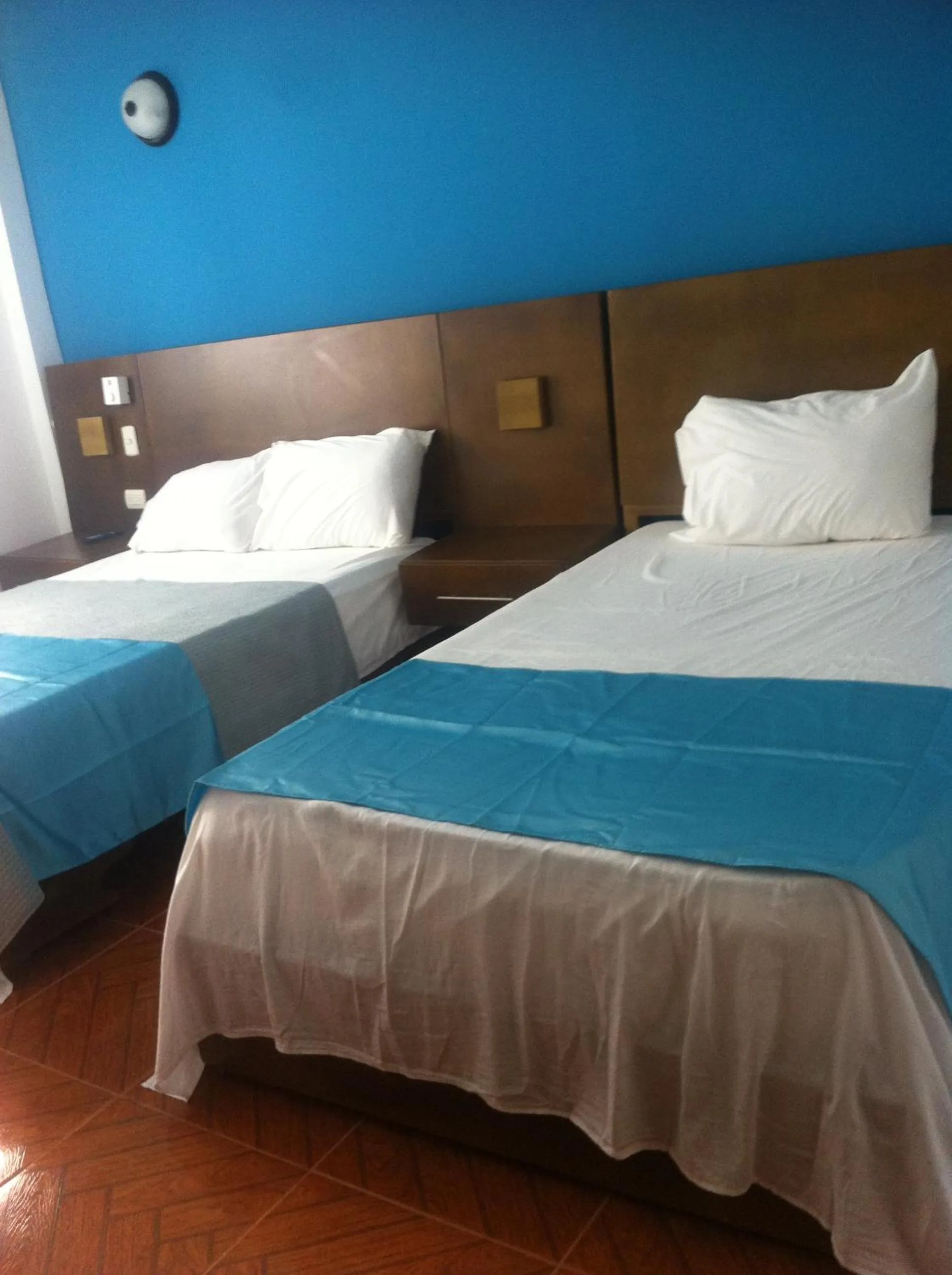 Bed in Figaro Hotel Samana