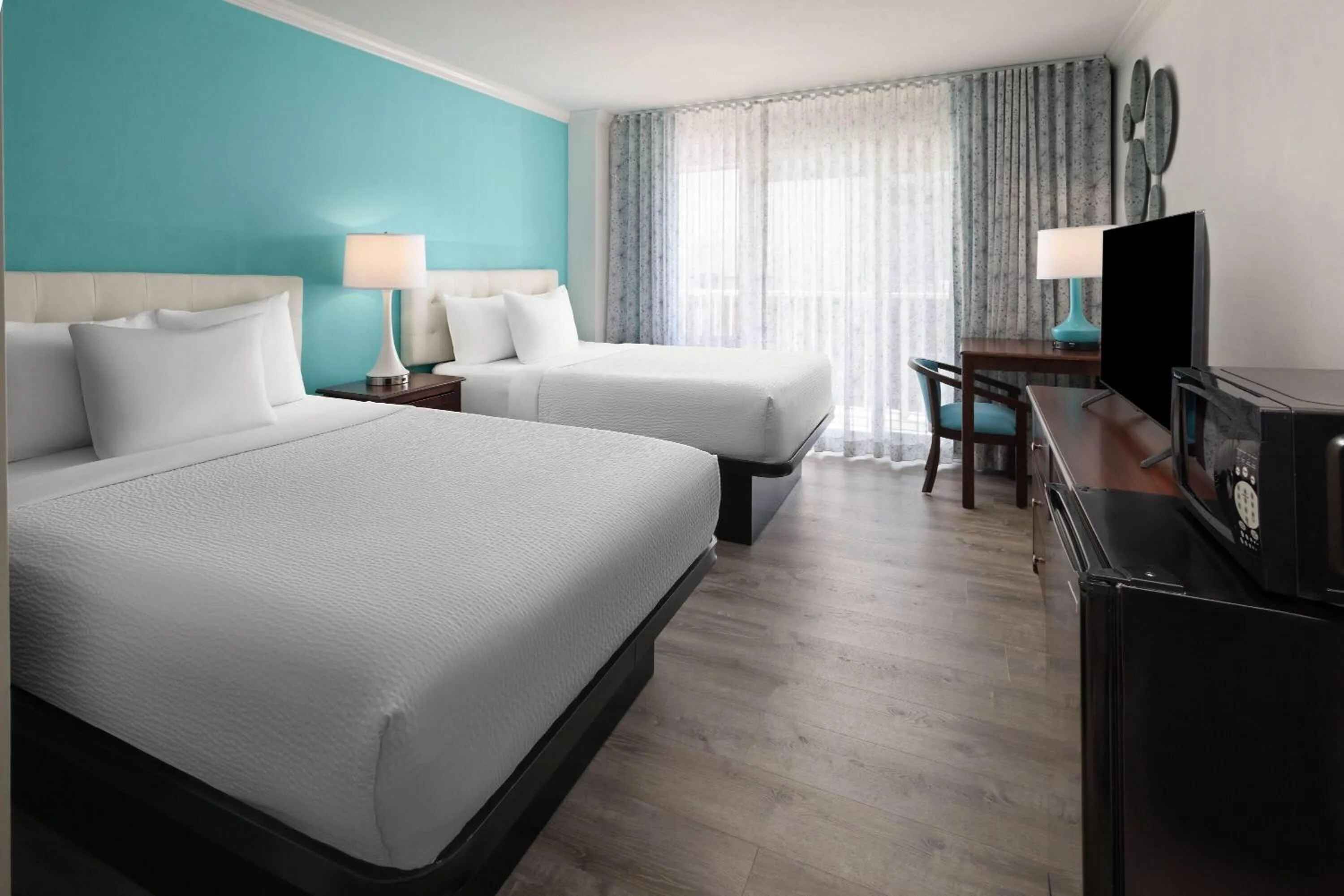Photo of the whole room, Bed in Howard Johnson Plaza by Wyndham Ocean City Oceanfront