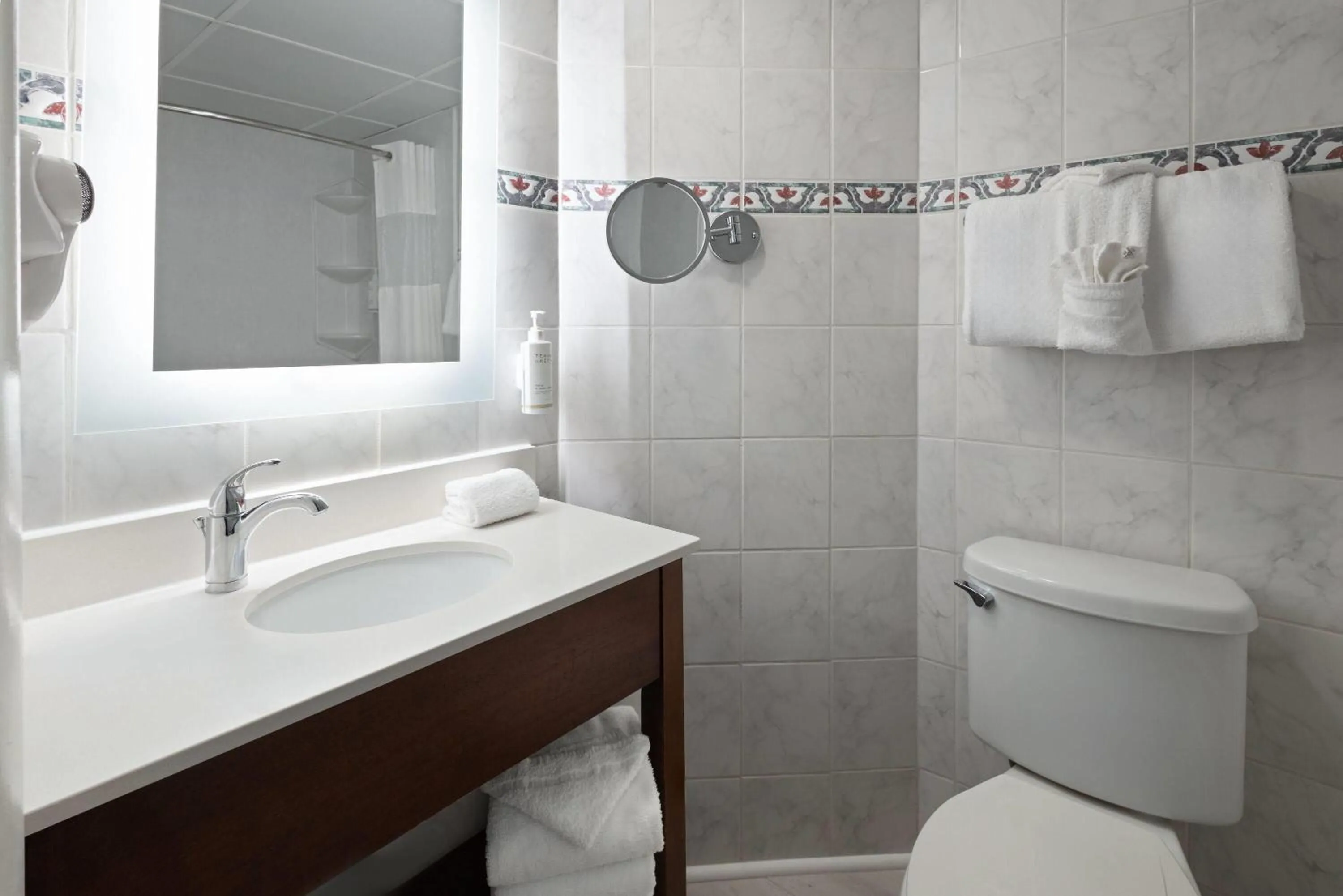 Bathroom in Howard Johnson Plaza by Wyndham Ocean City Oceanfront