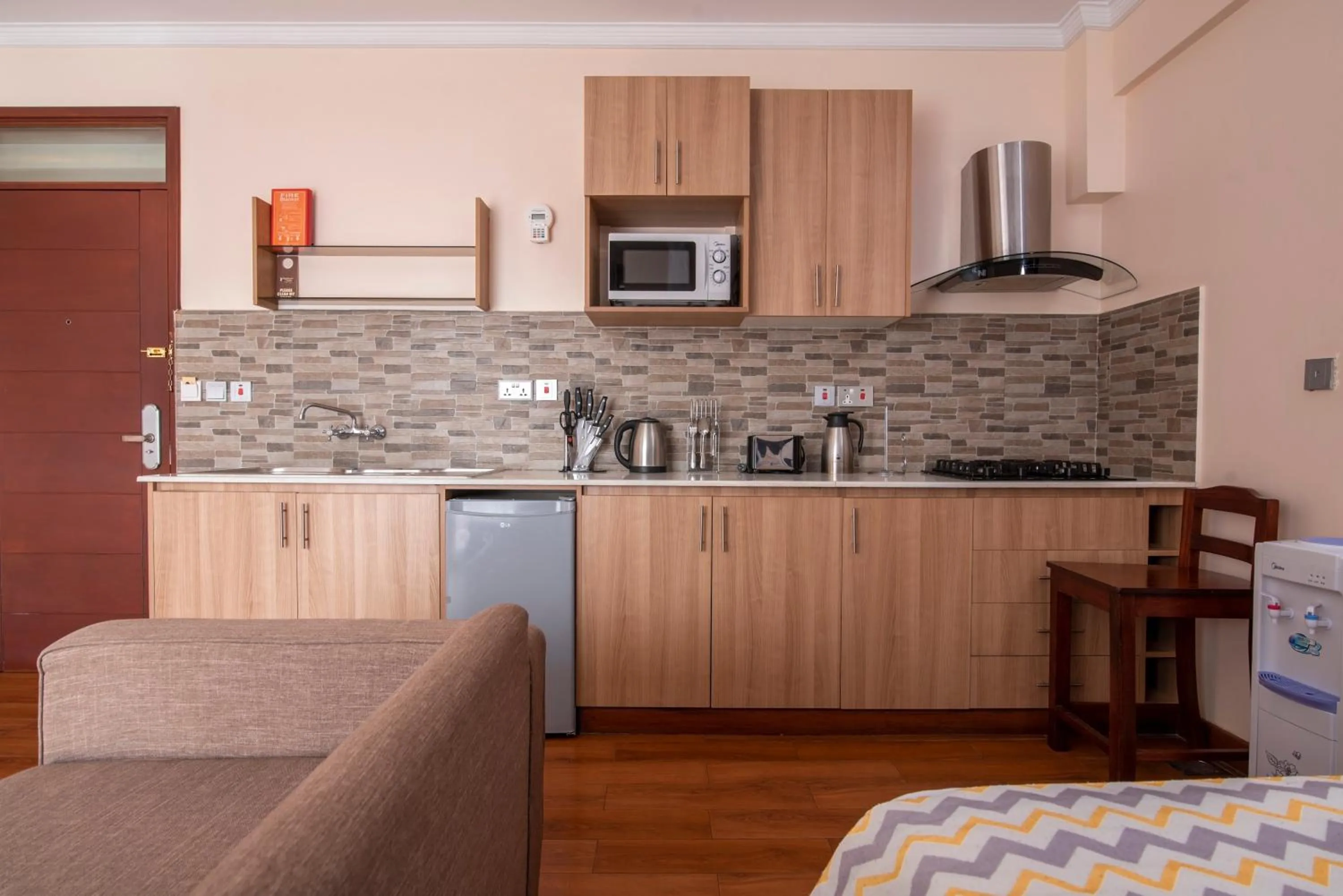 Kitchen or kitchenette in Highlands Suites Hotel Apartments