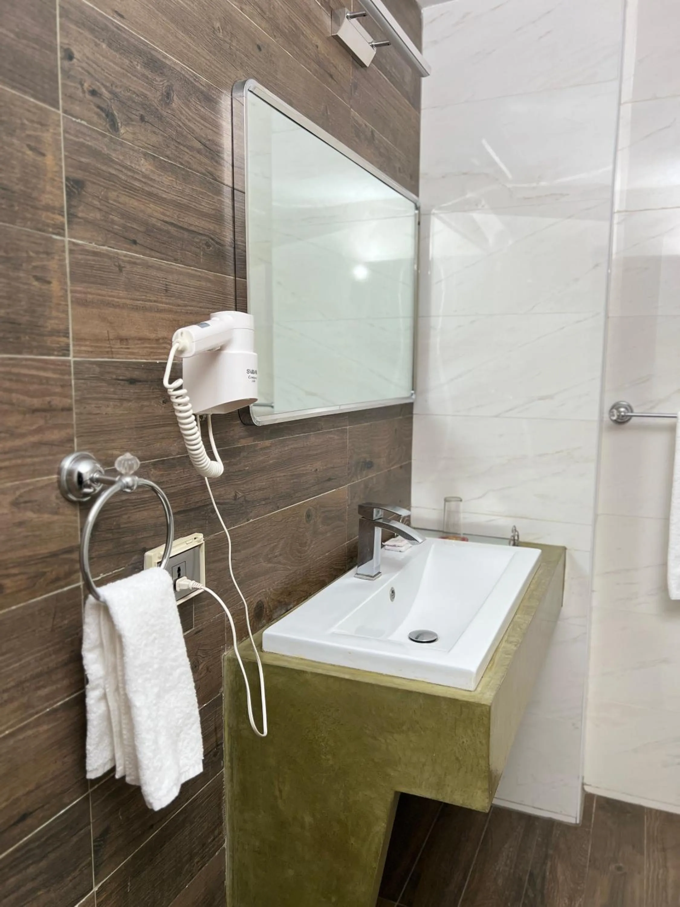 Shower in Hotel VDN by Good Rade