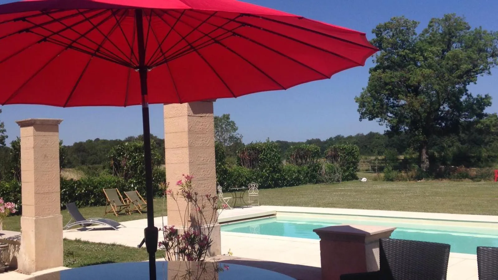 Pool view in Manoir la Rumillette