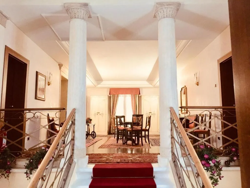 Communal lounge/ TV room in Hotel La Loggia