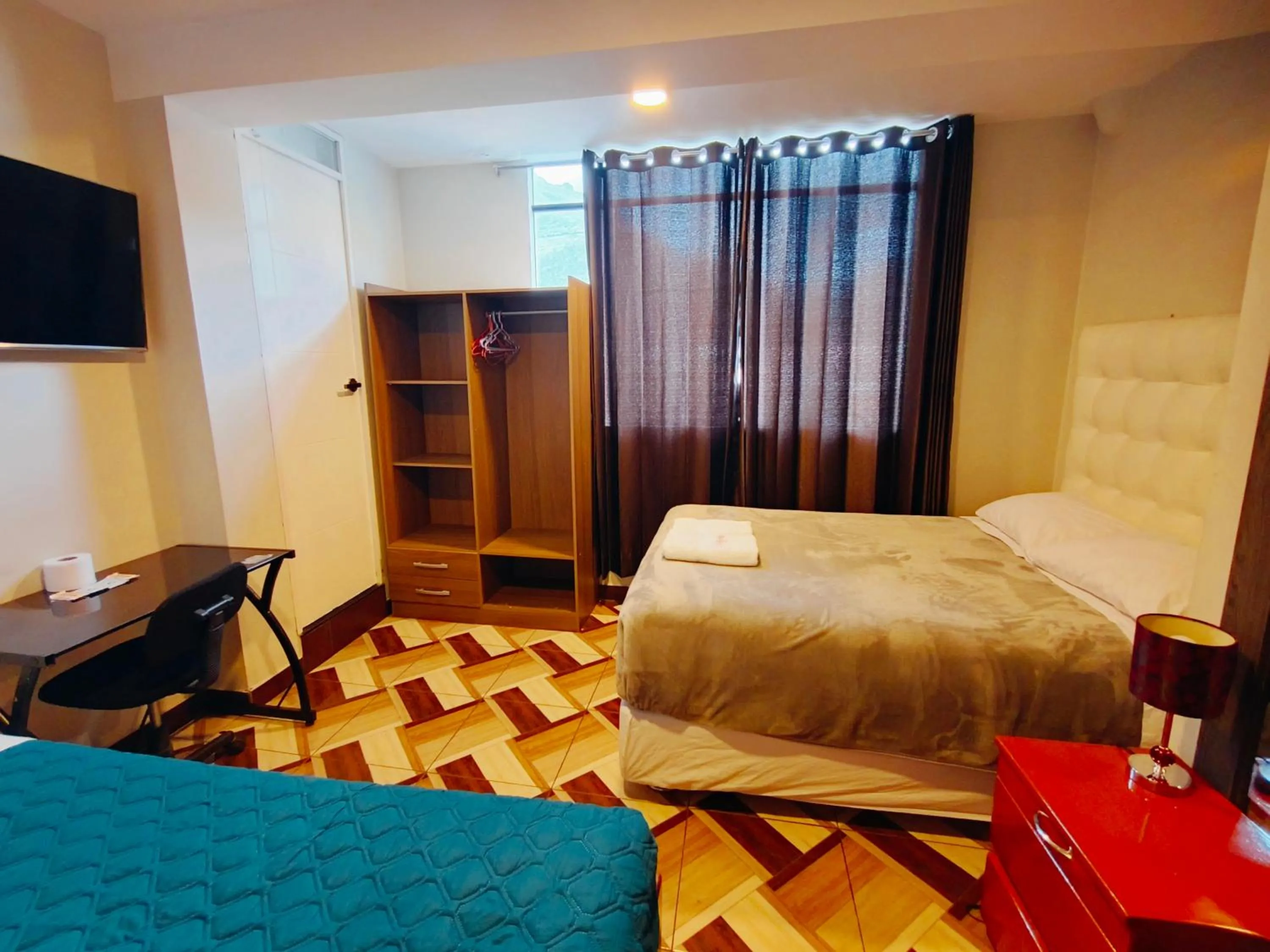 Bed in Hotel California Calca