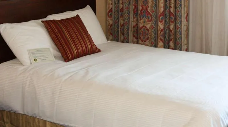 Bed in Maron Hotel & Suites