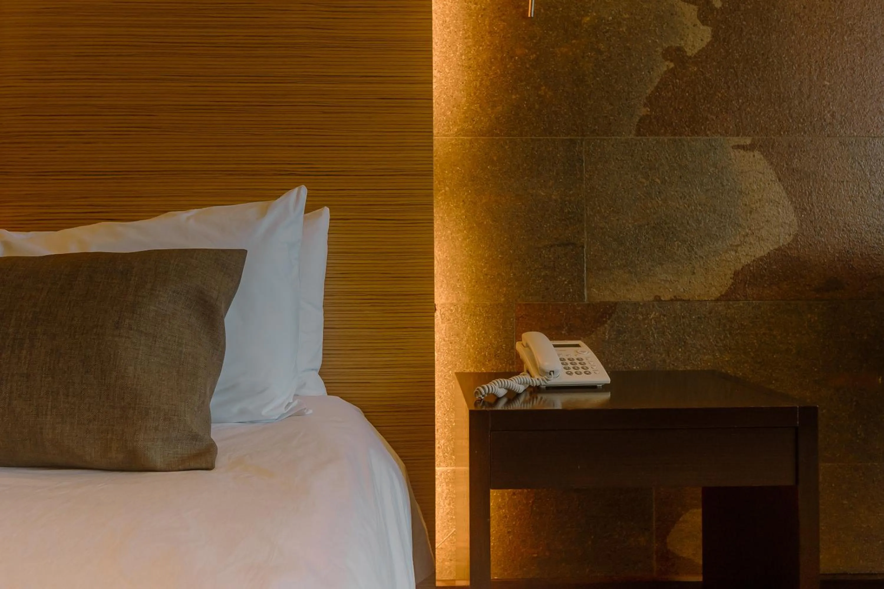 Bed in Rayentray Grand Hotel